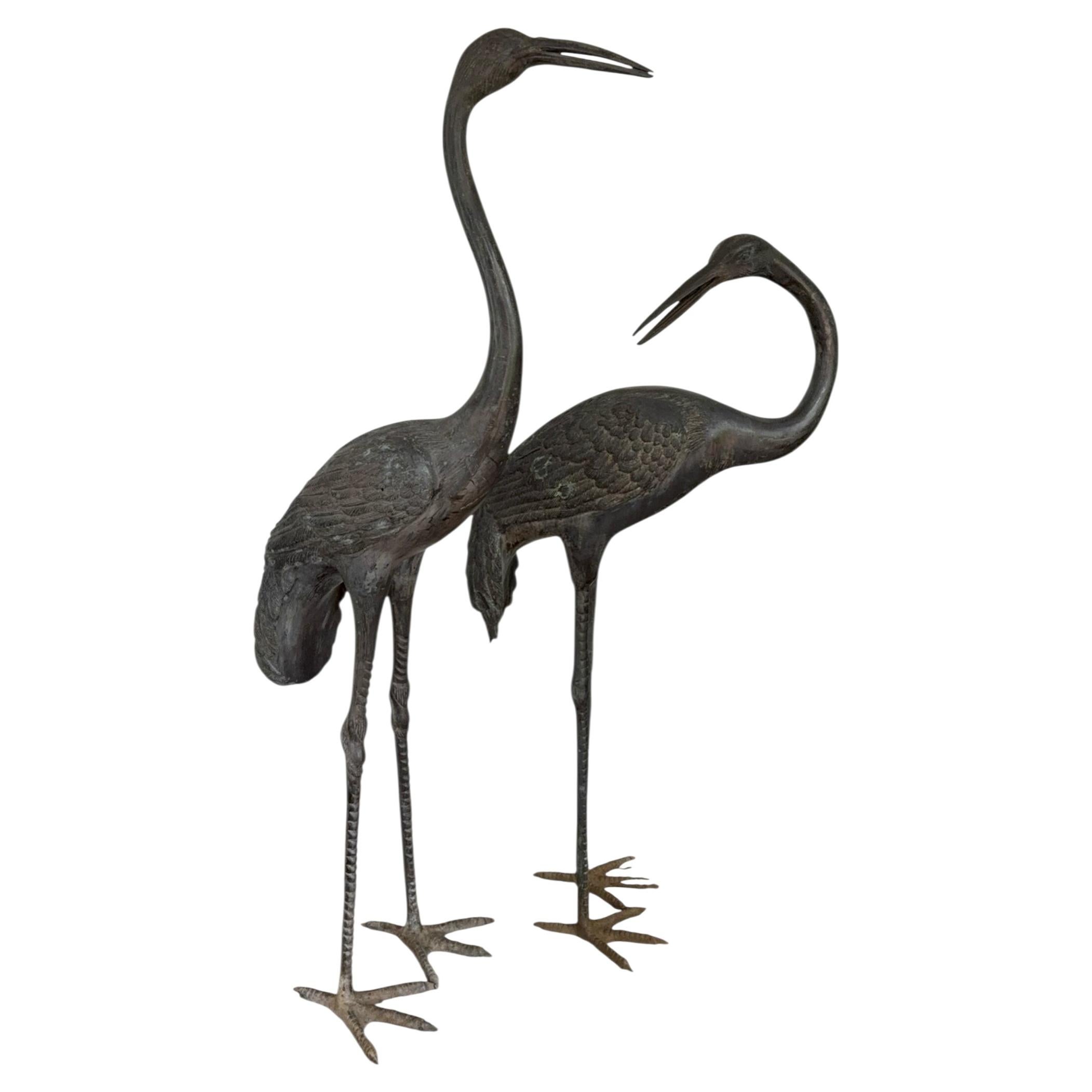 A Pair of Antique Bronze Crane Garden Sculptures