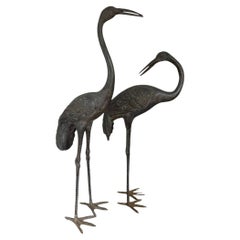 A Pair of Antique Bronze Crane Garden Sculptures