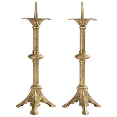 A Pair of Antique Bronze Gothic Style Candlesticks
