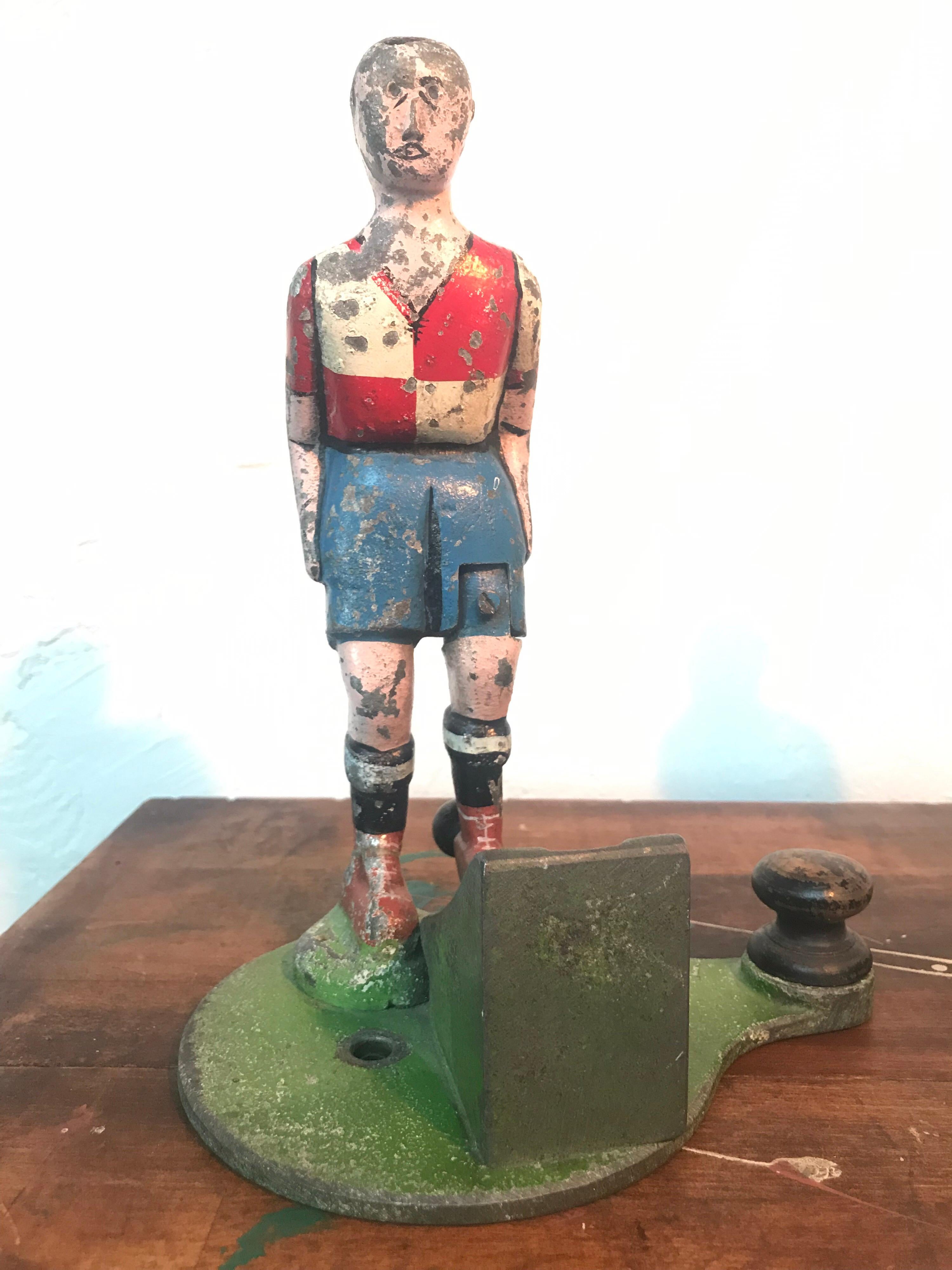 A pair of very decorative antique soccer players from a fun fair carnival game
Great patina and still in working condition.