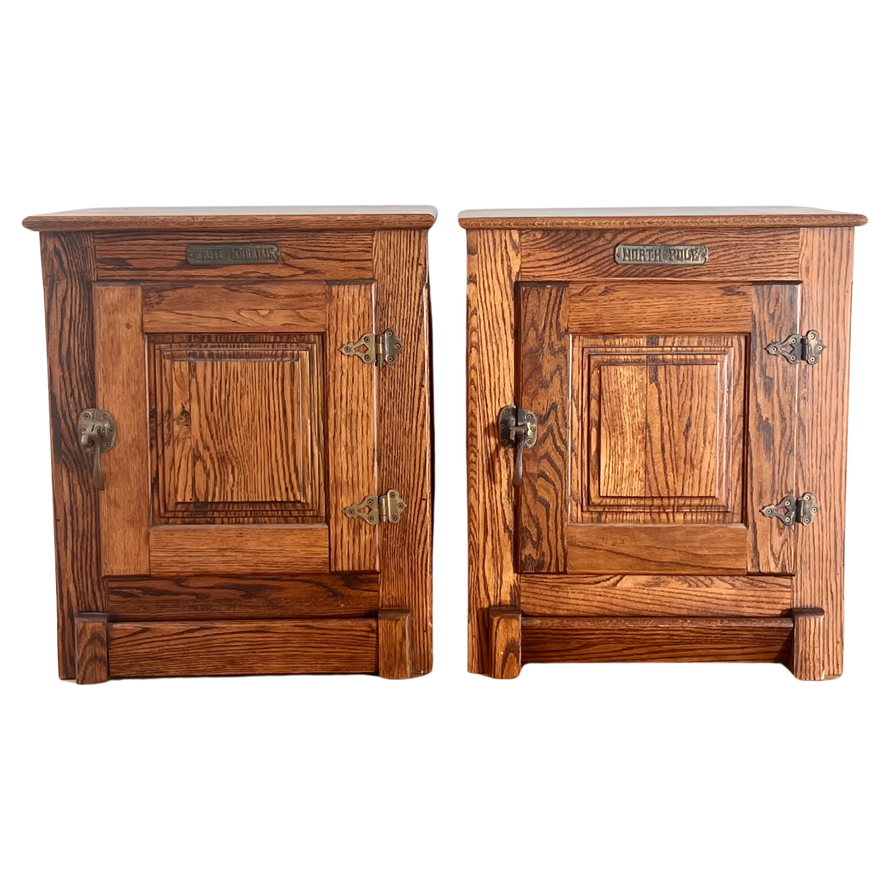 A pair of antique craftsman nightstands in oak, circa 1900