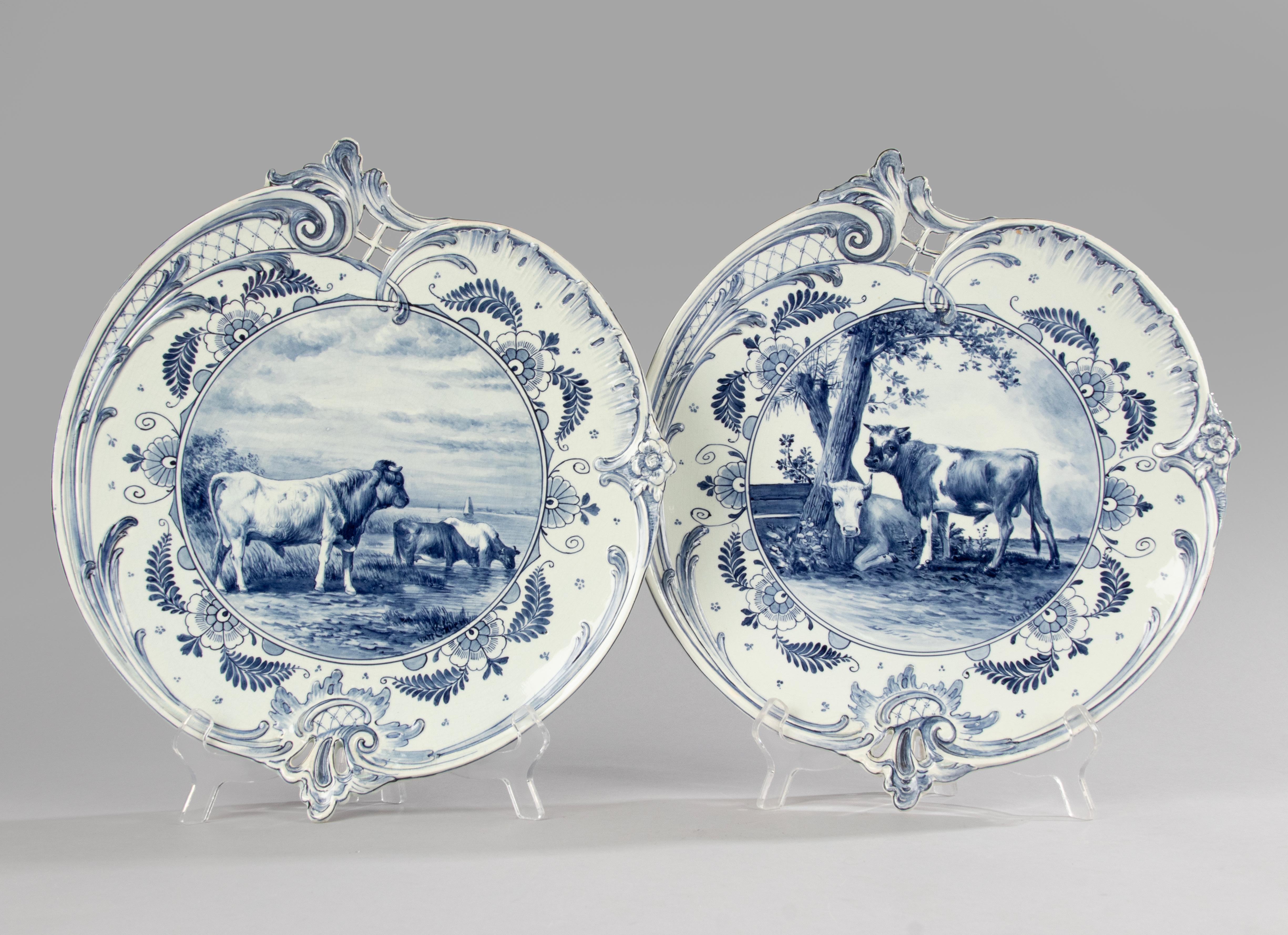A beautiful pair of large ceramic Delft wall plates. Decorated with romantic landscape scenes with cows. 
The plates are marked on the back 'Royal Bonn', 
The 'Royal Bonn' brand was used between 1890 and 1919 by the factory of Franz Anton Mehlem in