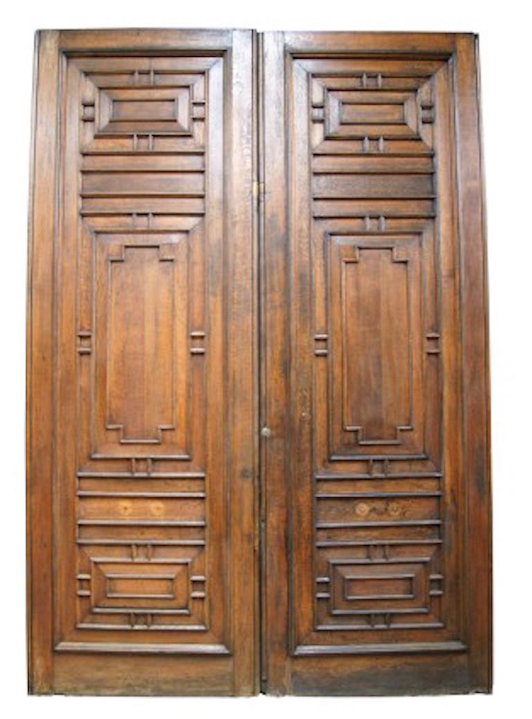 A pair of high quality 19th century, 12 ft oak doors. These were acquired by a long established architectural antiques business as part of the clearance of surplus materials from the Houses of Parliament / Palace of Westminster following