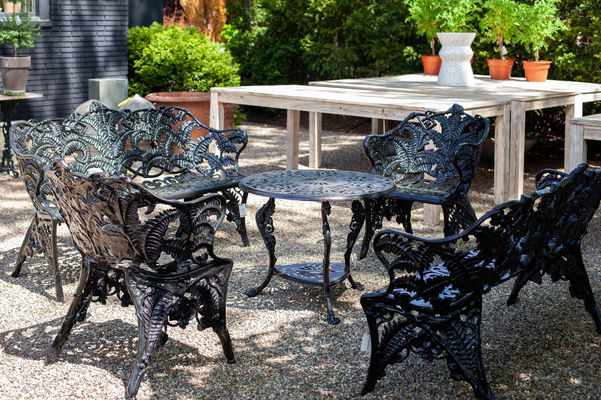 Harkening back from the Age of Innocence of the Edwardian Era, these chairs will add a layer of sophistication to any garden space. Original castings with a fresh coat of black paint will modernize a space with a fresh take on old-world