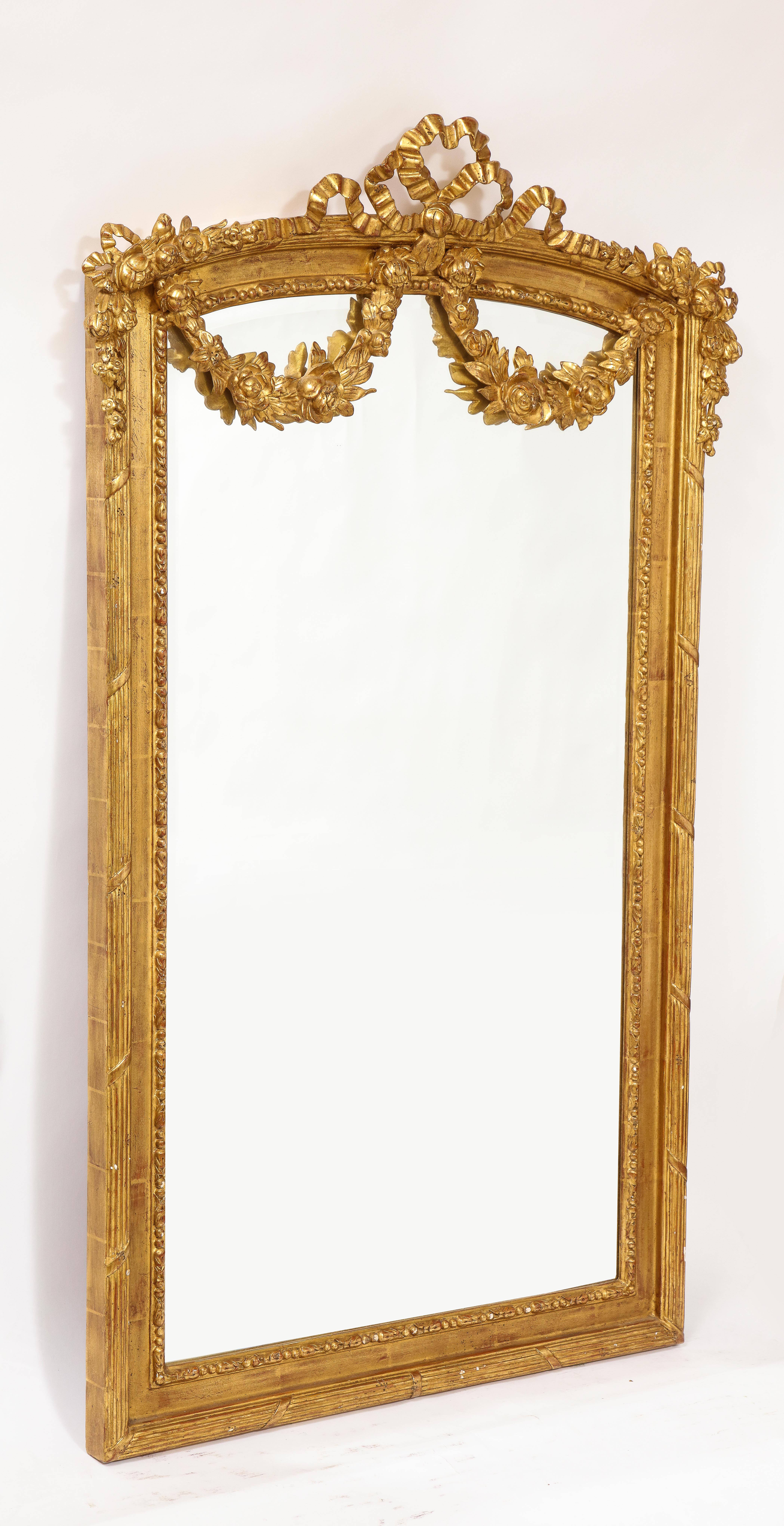 Late 19th Century Pair of Antique French Louis XVI Style Hand Carved Giltwood Mirrors For Sale