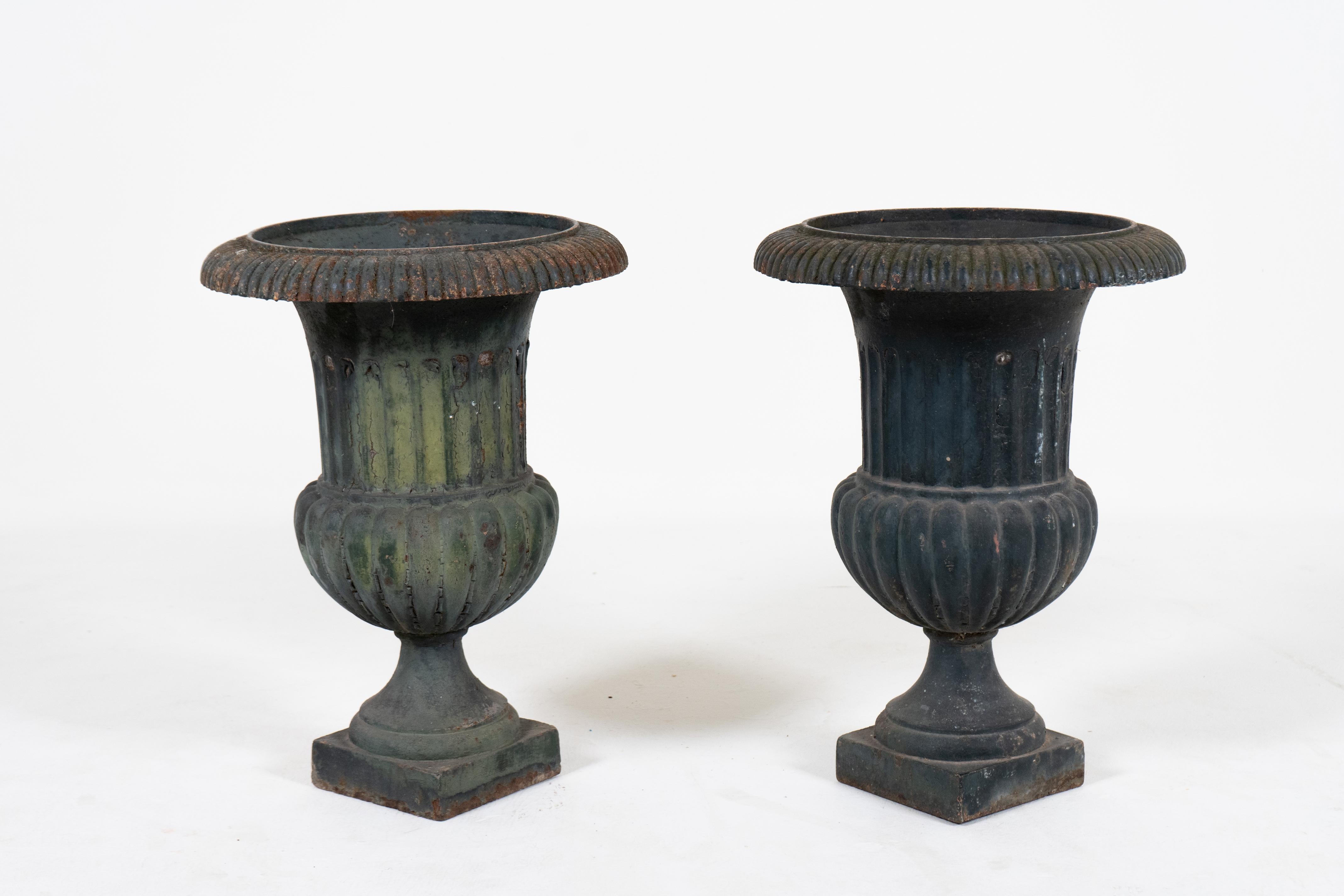 Cast A Pair of Antique French Neoclassical Iron Garden Urns in Black For Sale
