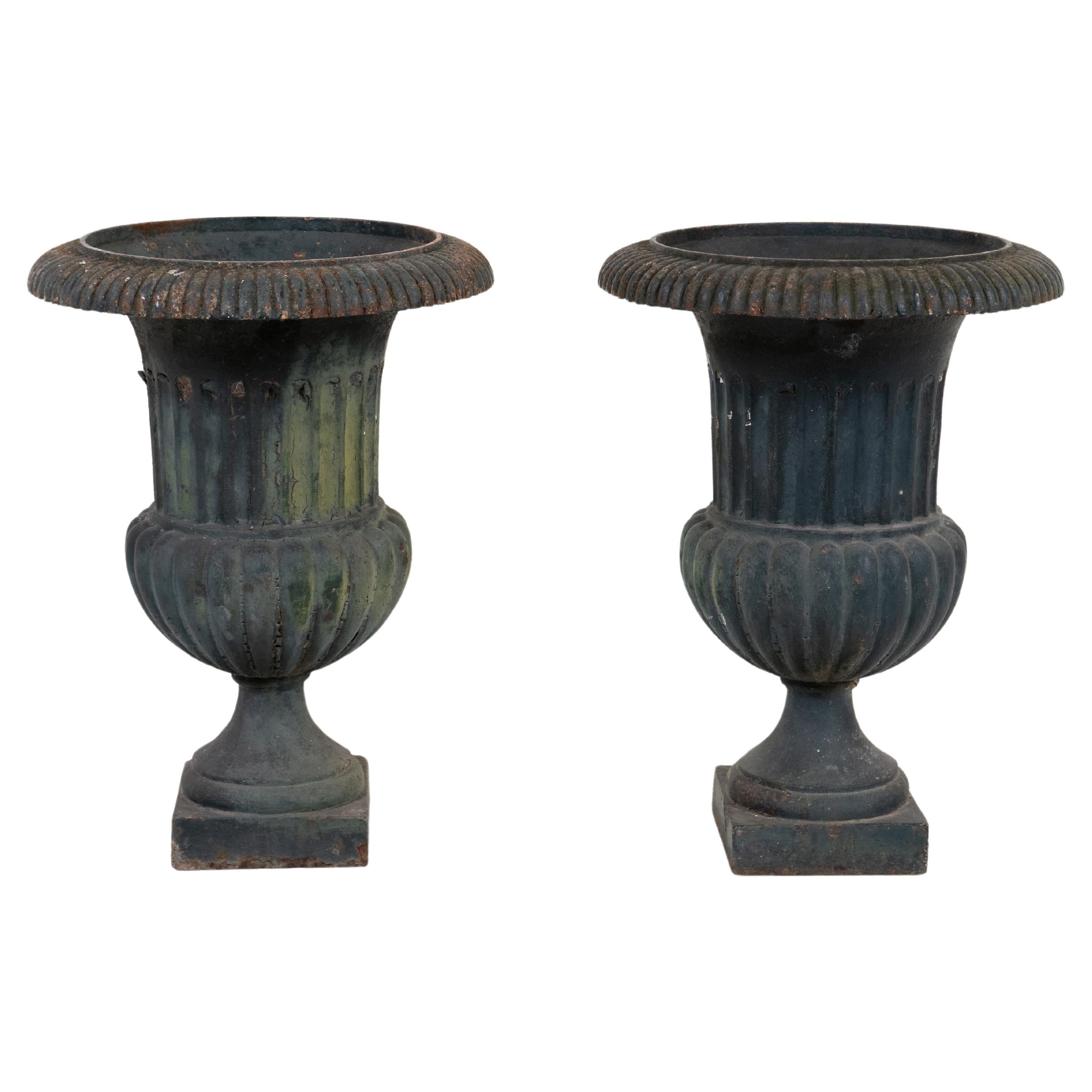 A Pair of Antique French Neoclassical Iron Garden Urns in Black For Sale