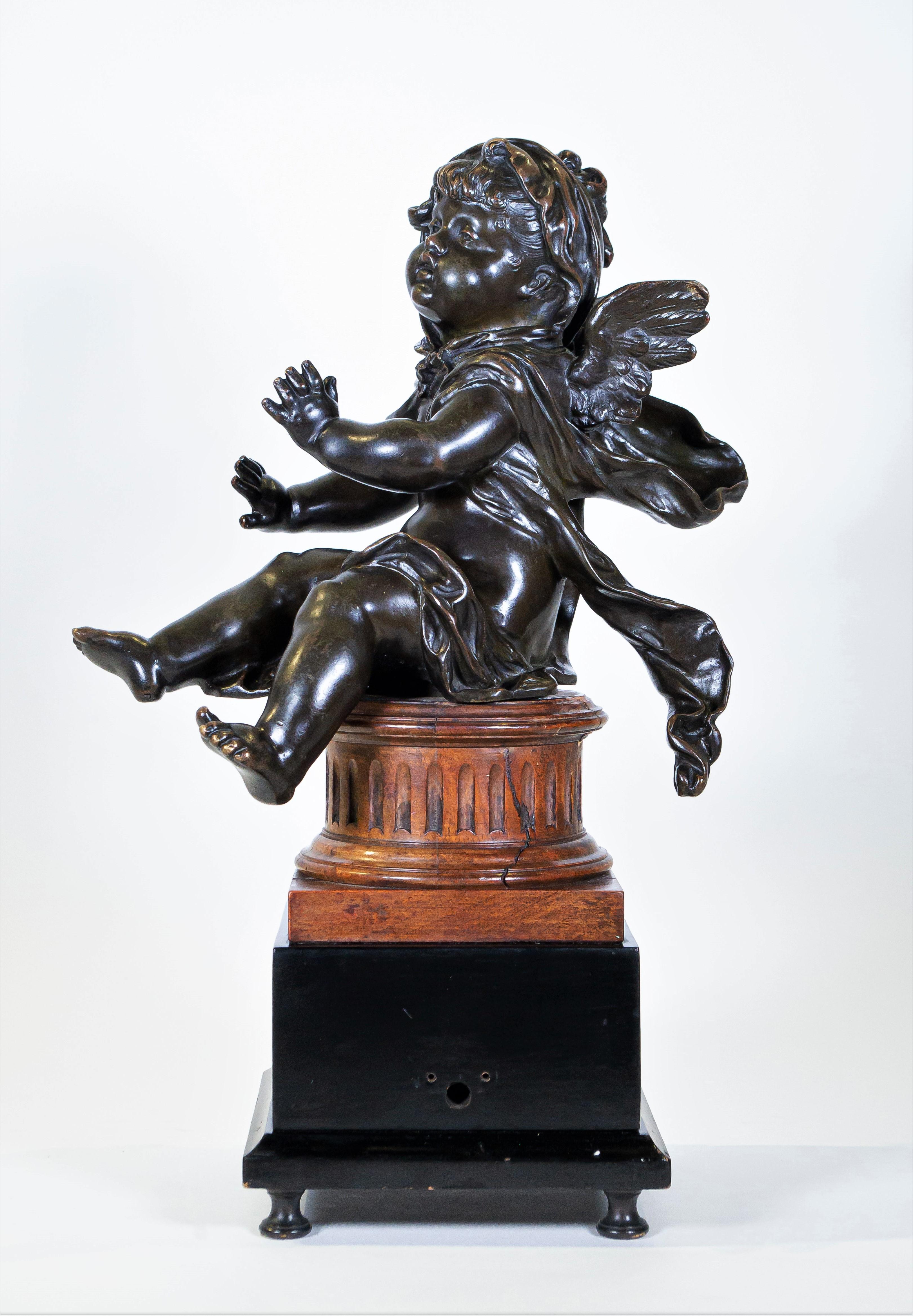 Pair of Antique French Patinated Bronze Winged Putti Seated on Fluted Plinths For Sale 5