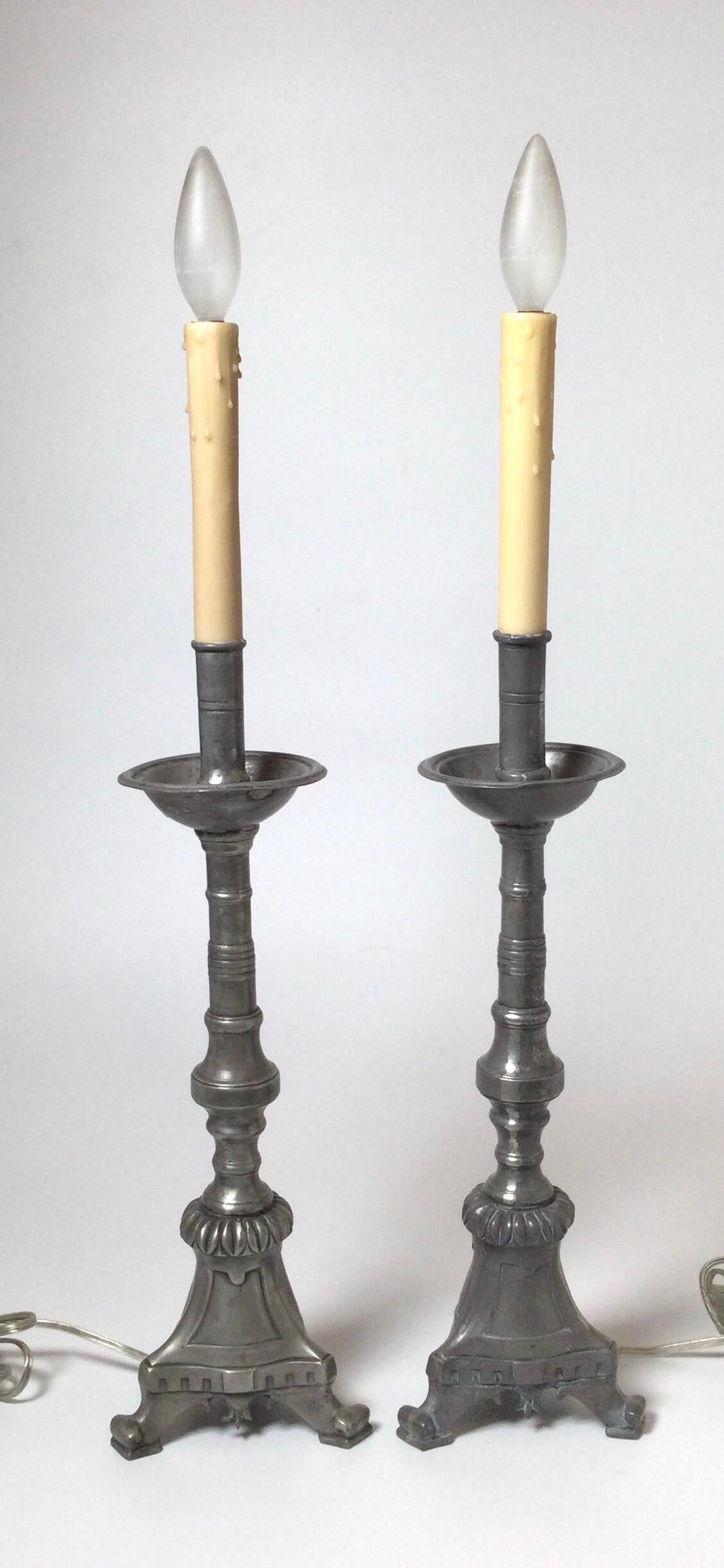 A pair of cast pewter candlesticks lamps with French parchment shades. The lamps alone are 5' wide, 5