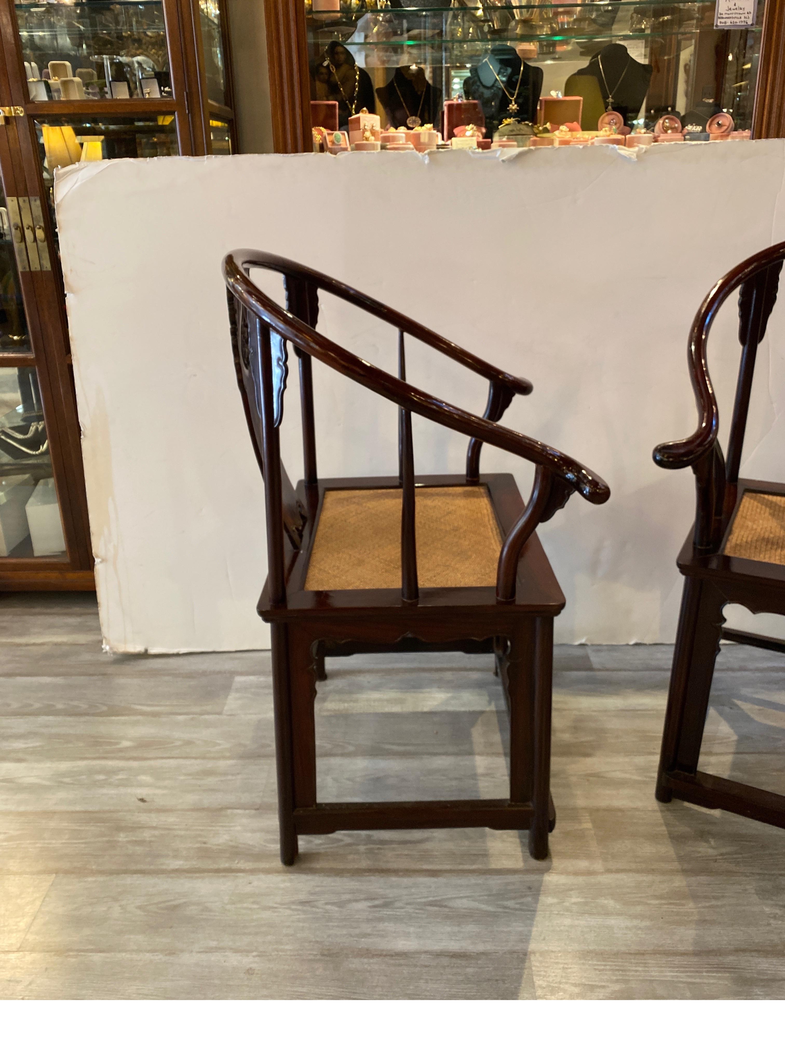 Hand-Carved Pair of Antique Hand Carved Chinese Horseshoe Back Arm Chairs