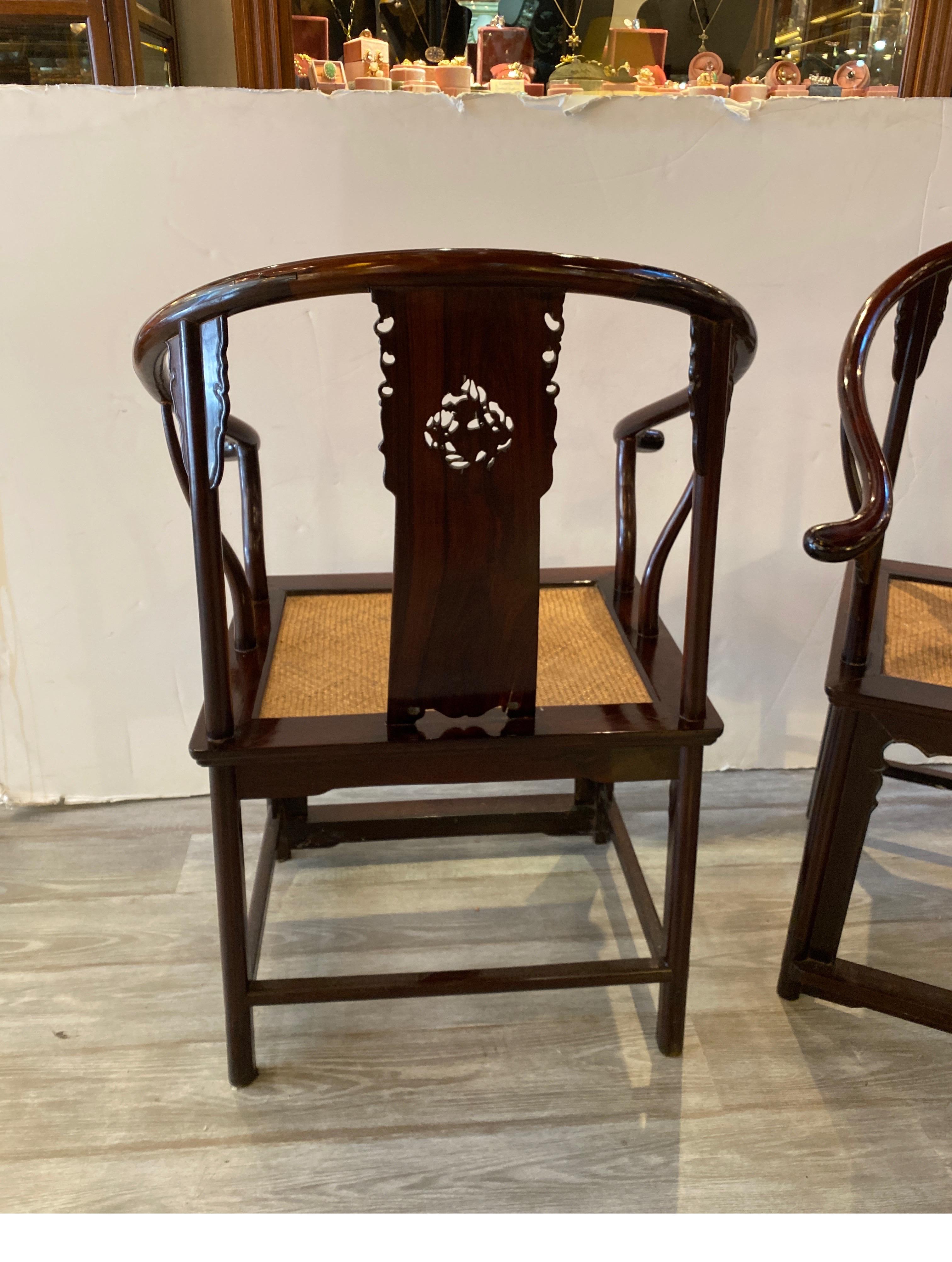 Pair of Antique Hand Carved Chinese Horseshoe Back Arm Chairs In Good Condition In Lambertville, NJ