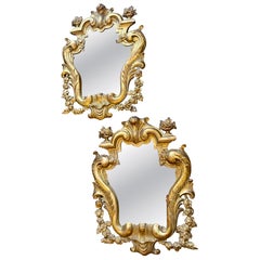A Pair Of Antique Italian Gold Giltwood Carved Mirrors
