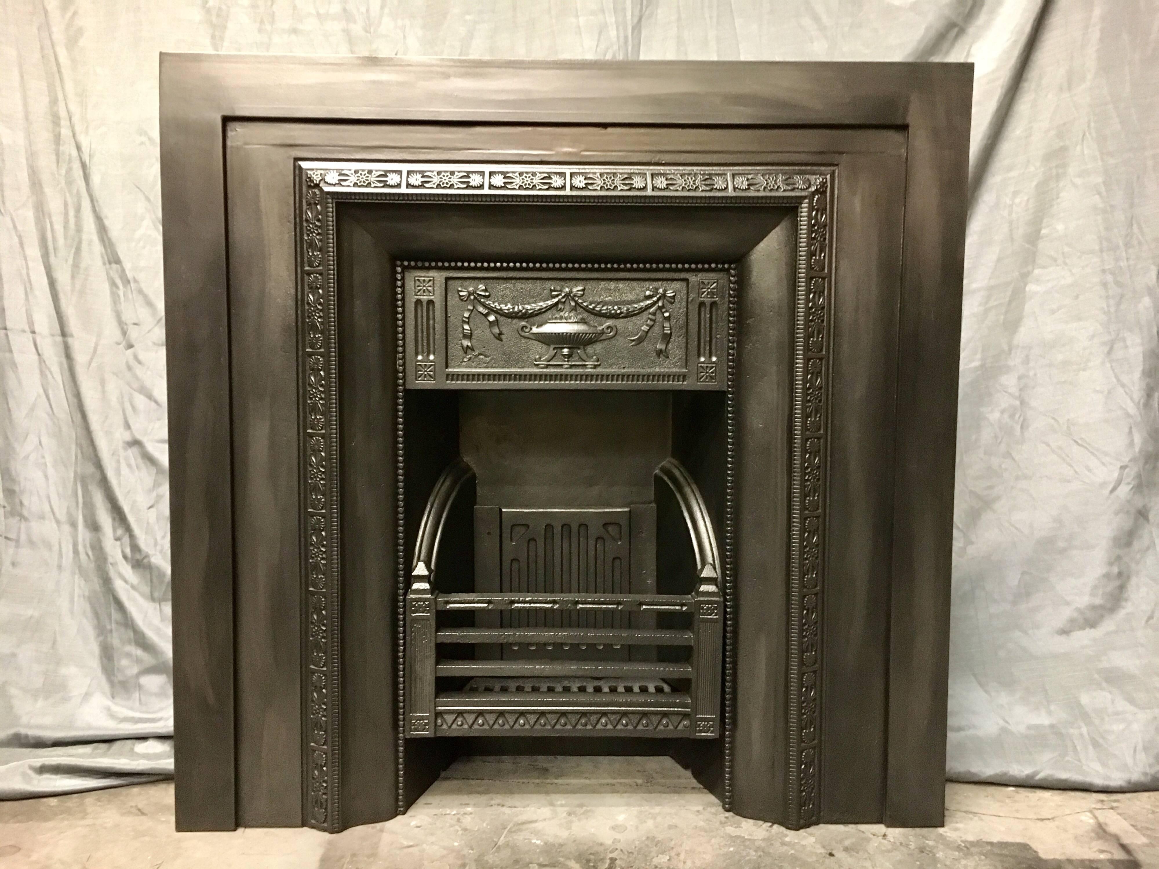 A matching pair of mid-19th century cast iron fireplace inserts probably cast in Falkirk, West Lothian, Scotland. The pair were salvaged from Preston Hall House, Midlothian, Scotland. An important Stately home first constructed around 1700c, further