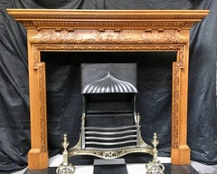 Pair of Antique Oak Georgian Style Carved Wood Fireplace Surrounds