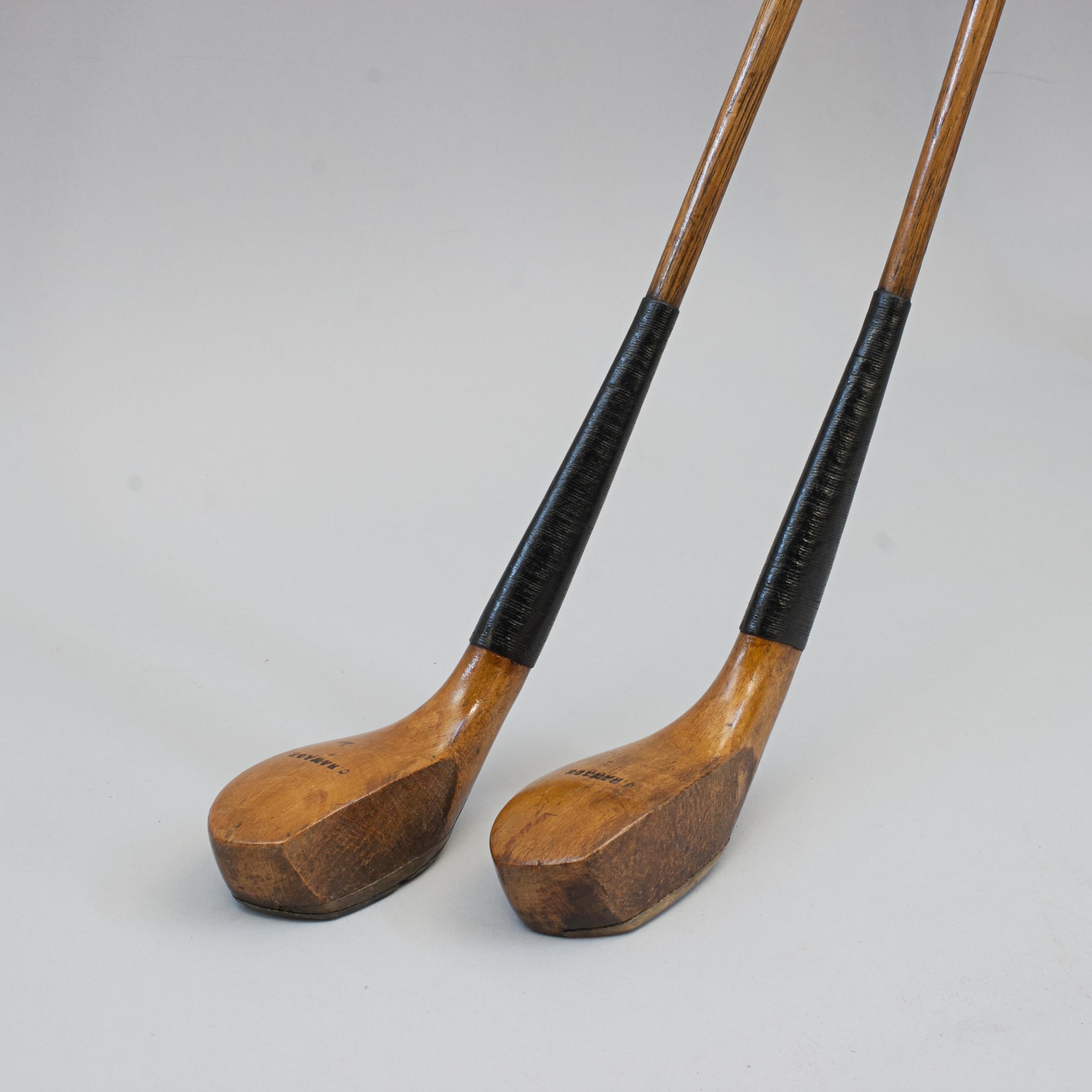 Antique Scared Head Charles Ramage Woods.
An elegant pair of transitional scared head beech wood hickory golf clubs by Charles Ramage, Brighton & Hove Golf Club (1888 - 1902). This great looking pair of usable scared head clubs, driver and brassie,