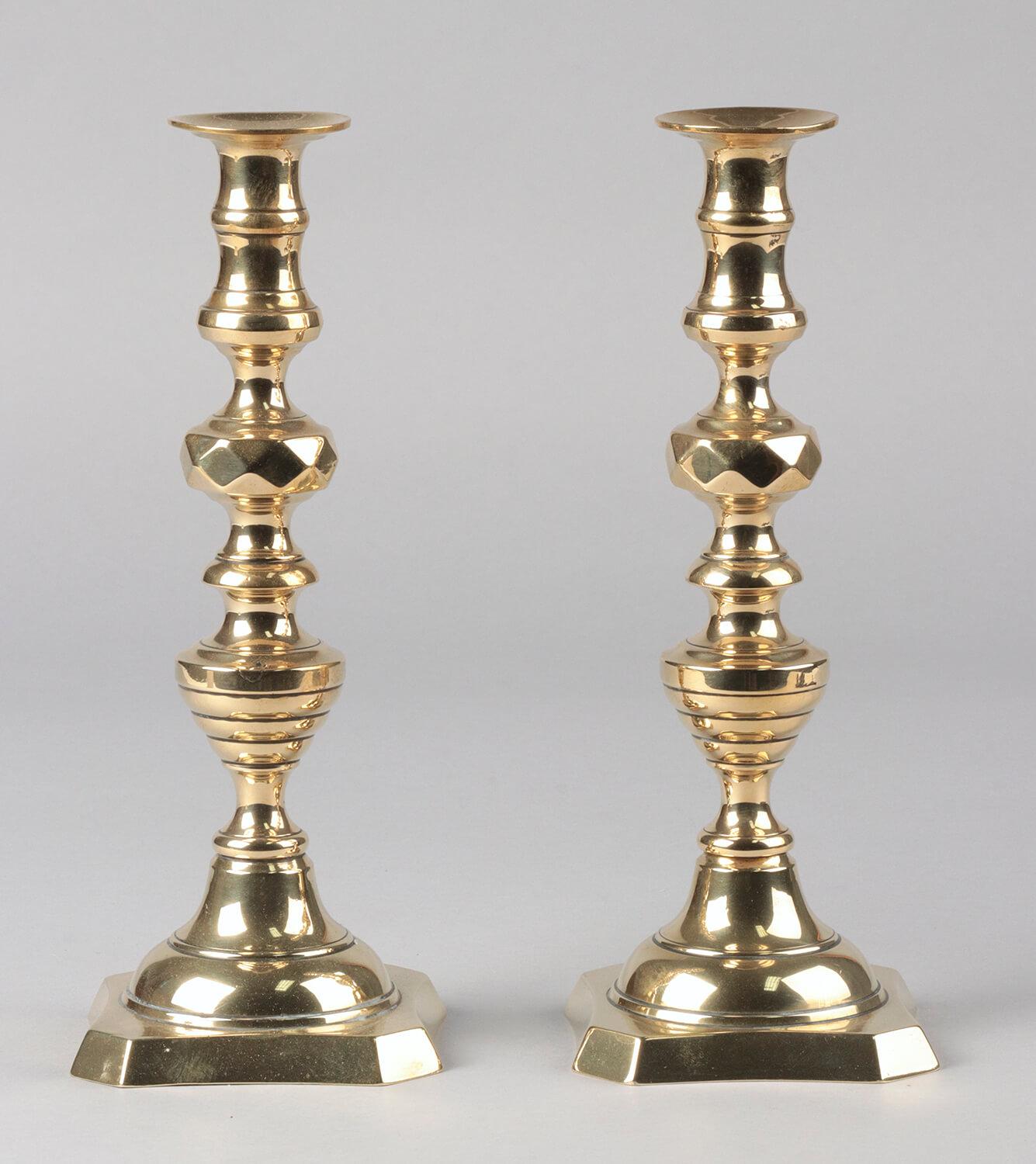 A beautiful set of 2 antique candlesticks from the Victorian era. The candlesticks have a beautiful design, with many geometric shapes composed.