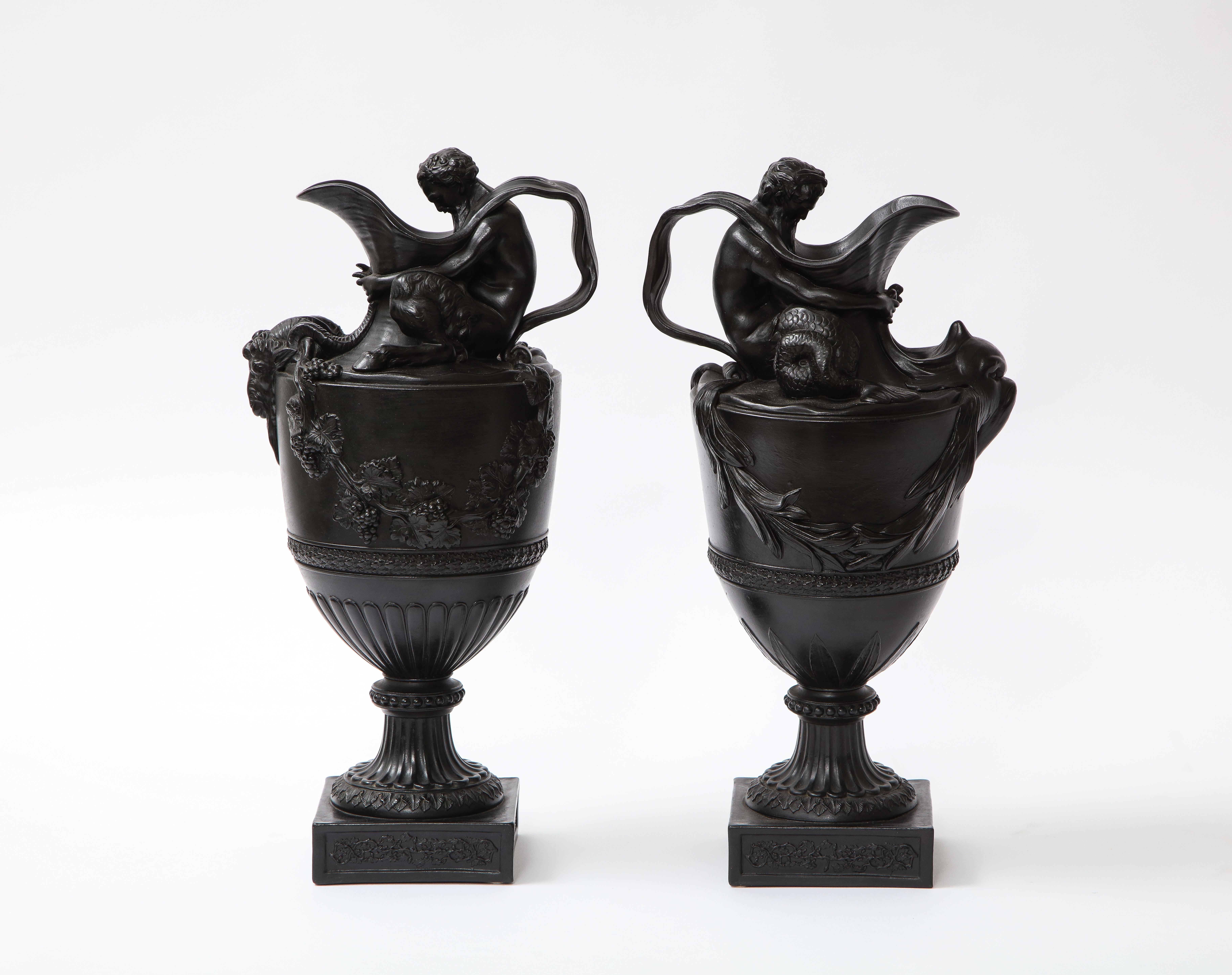 Neoclassical Pair of Antique Wedgwood Black Basalt Ewers Emblematic of Water and Earth