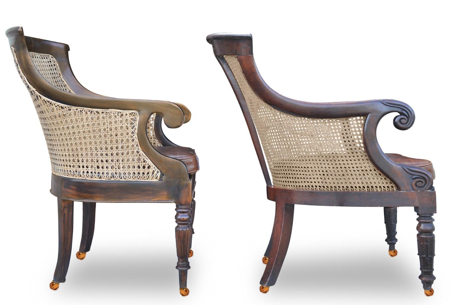 Vannerie Paire d'anciens fauteuils de bibliothèque en bois dur Cane Bergere et cuir  en vente