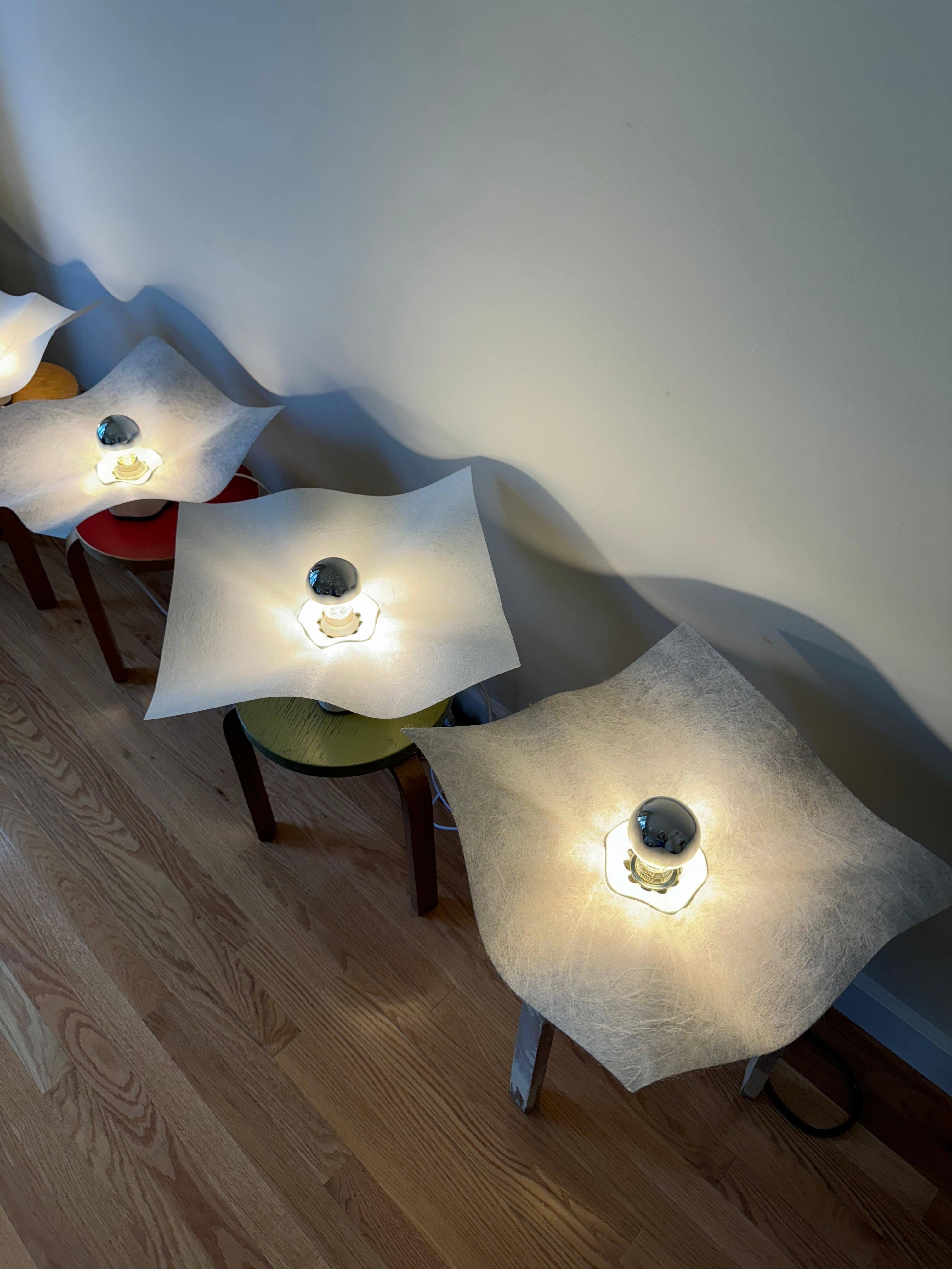 A pair of Area 50 (20) table lamp by Mario Bellini for Artemide 1