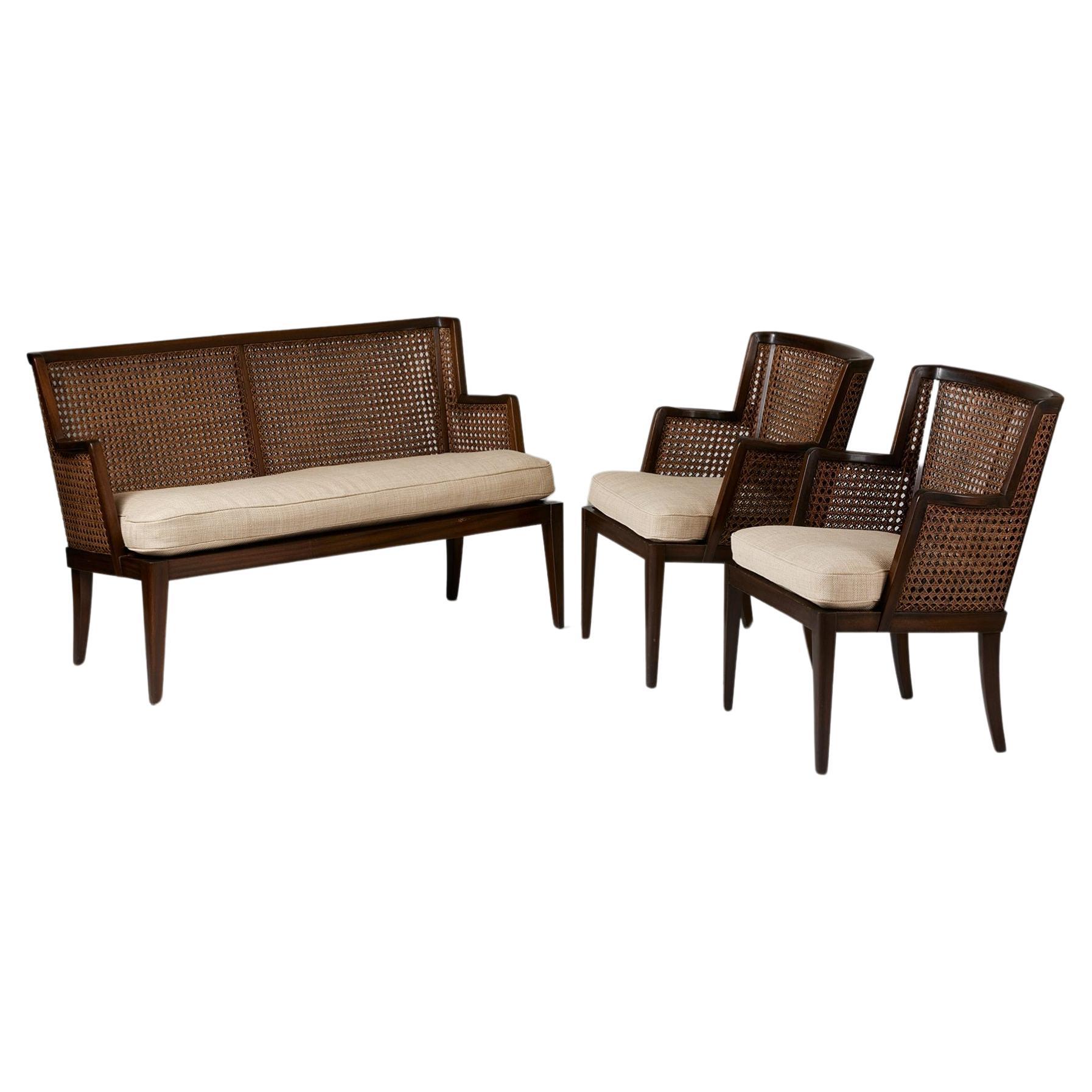 A pair of armchairs and sofa, anoynmous for Paul Boman, Finland, 1930s, rattan For Sale