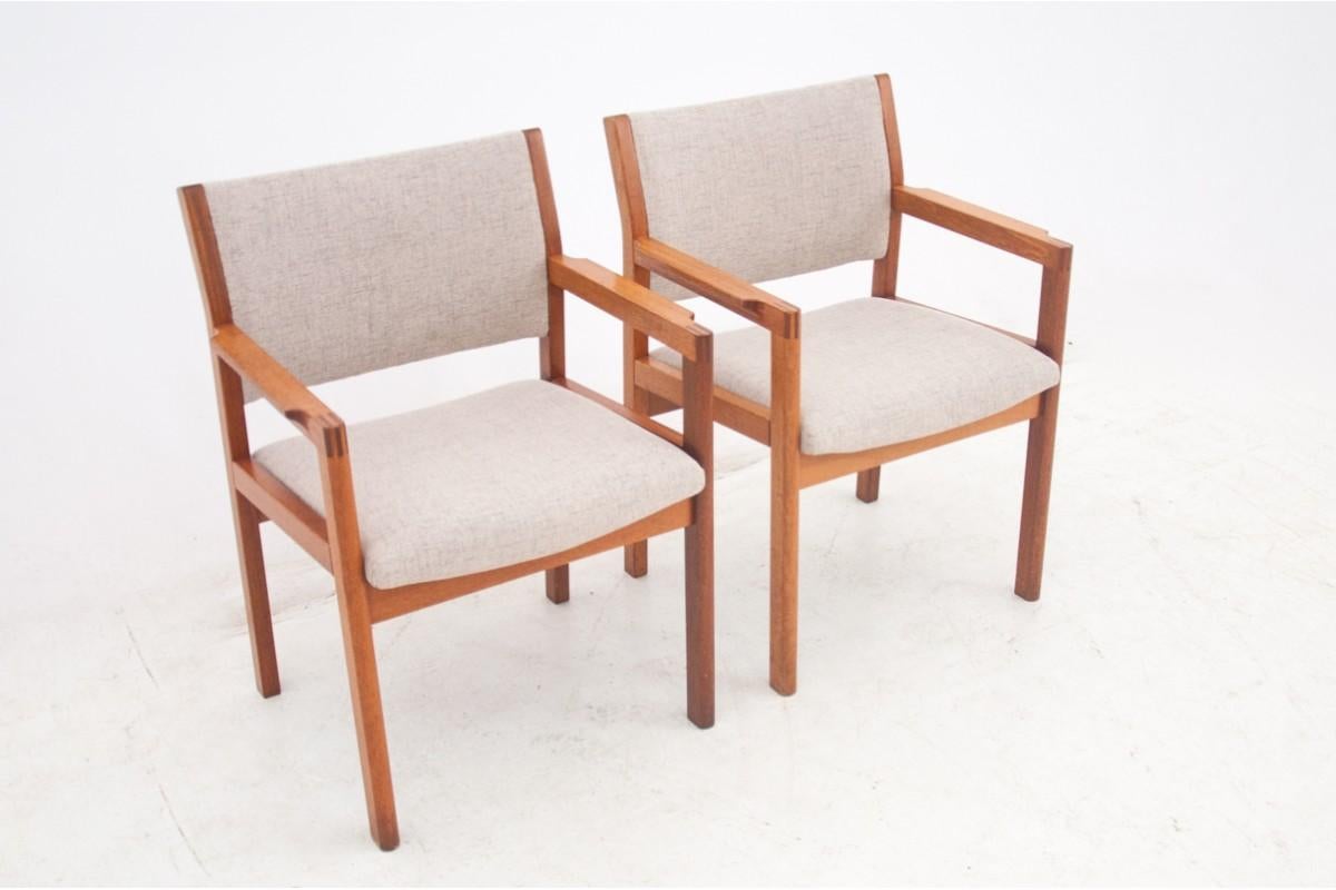 A pair of armchairs from Denmark from the 1960s.

Minimalist armchairs with a timeless look will fit perfectly into contemporary modern but also more classic interiors.

The armchairs have been upholstered in new, high-quality, beige fabric and the
