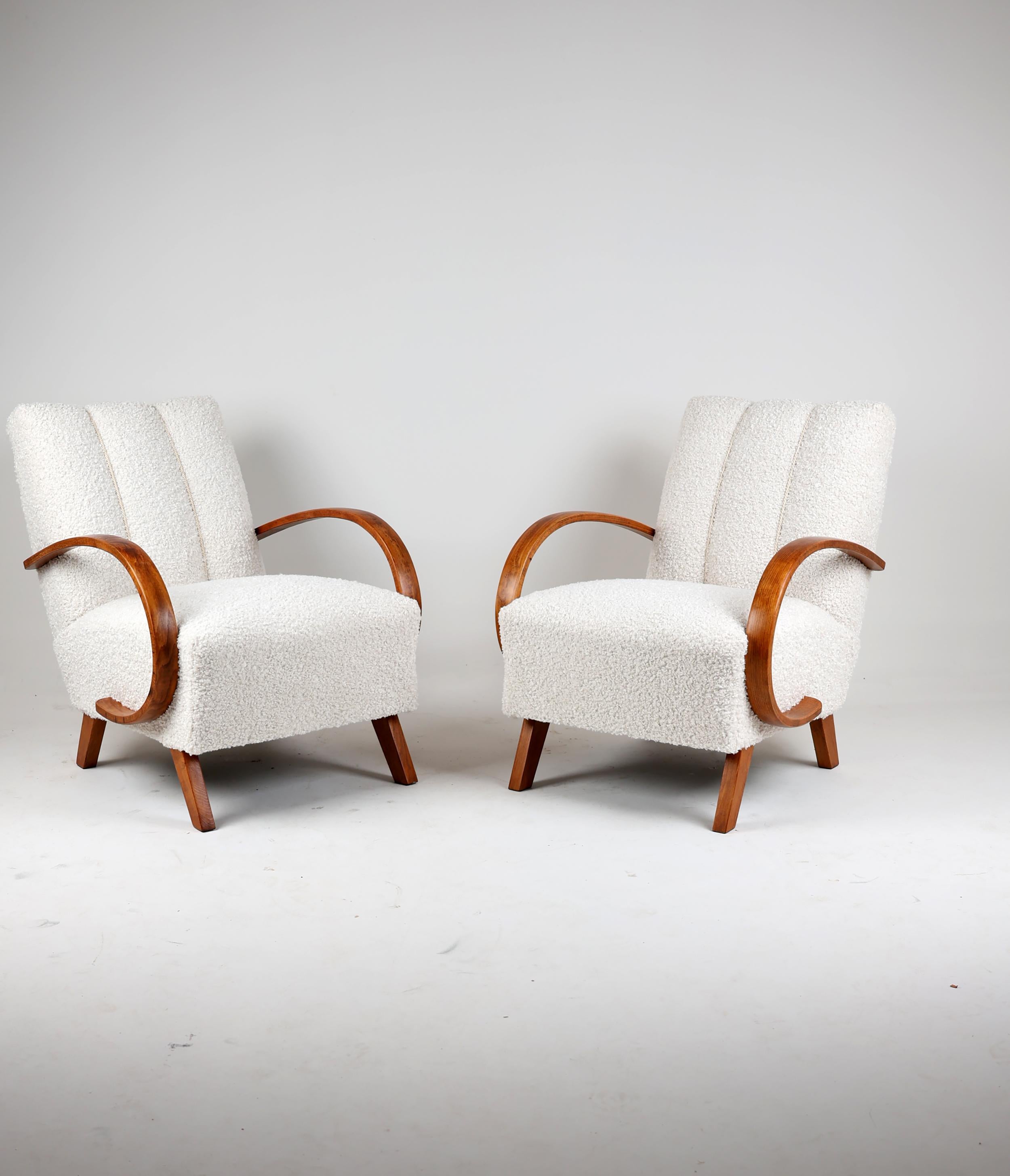A pair of Armchairs H-410 by Jindrich Halabala 
Czech Republic,  1950

A pair of armchairs by Czech furniture designer J. Halabala.
An armchair with perfect proportions and a timeless form. The main character is the H 410 model by Jendrich Halabali,