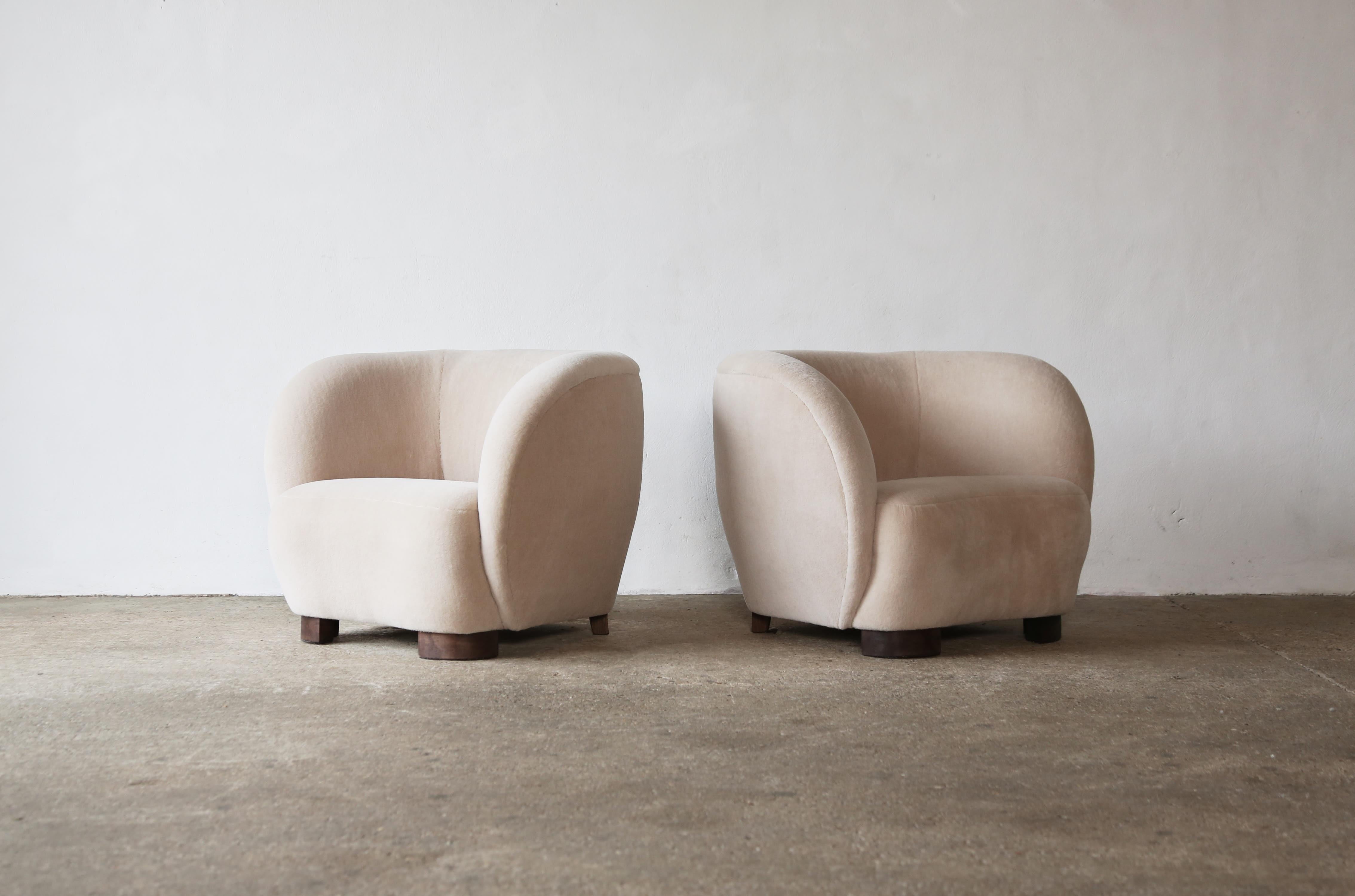 A elegant pair of modern armchairs, in the style of Flemming Lassen / Viggo Boesen, upholstered in pure Alpaca wool fabric.  Handmade beech frames and sprung seats.  Available in COM.  Fast shipping worldwide.



