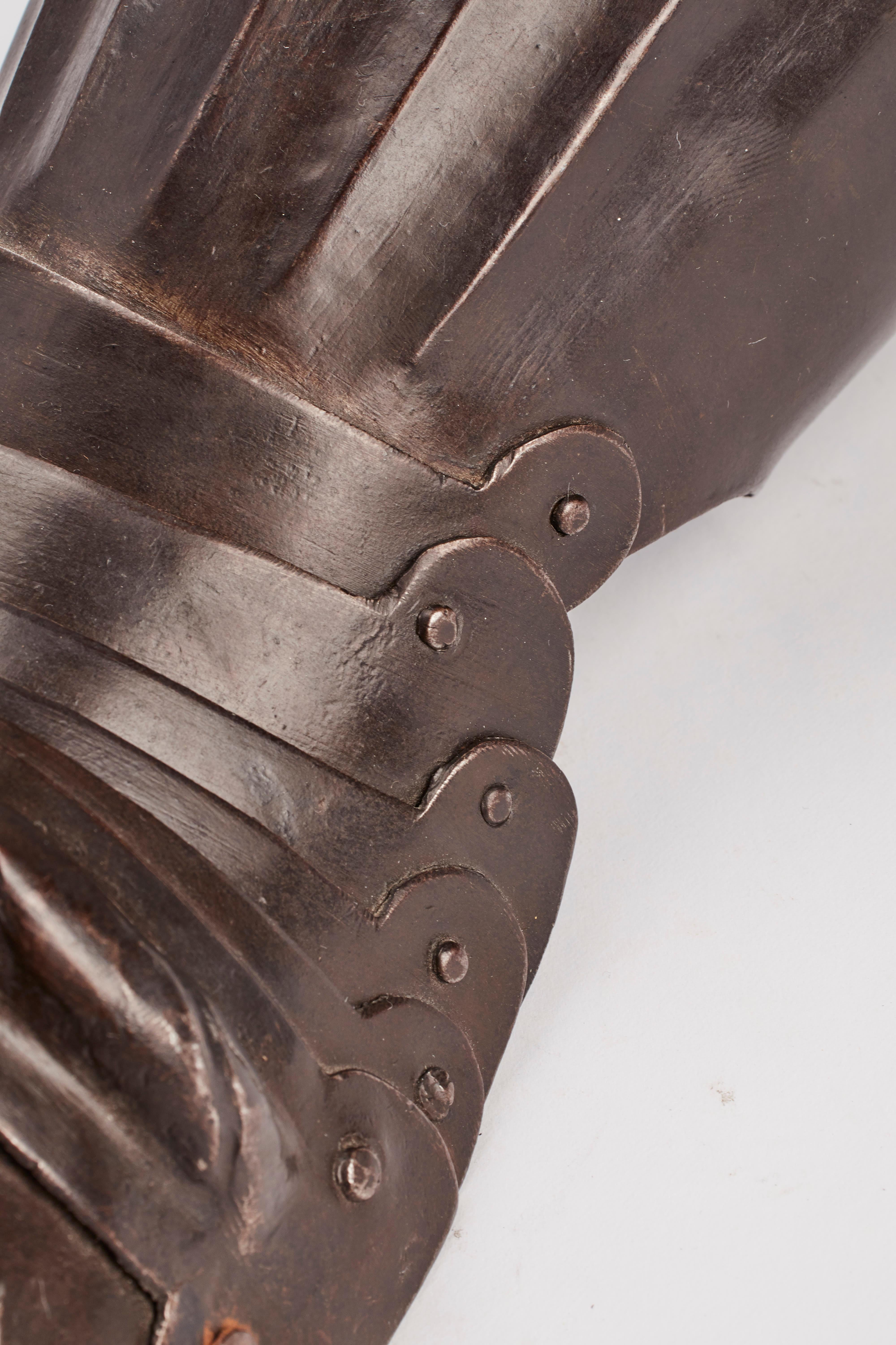A pair of Gauntlet made in Brescia, Lombardy, Italy, beginning the 17th century. Brescia, the most important and worldwide famous area of production of the best arms and armors at the time. The structure and finishing reflect the German similar