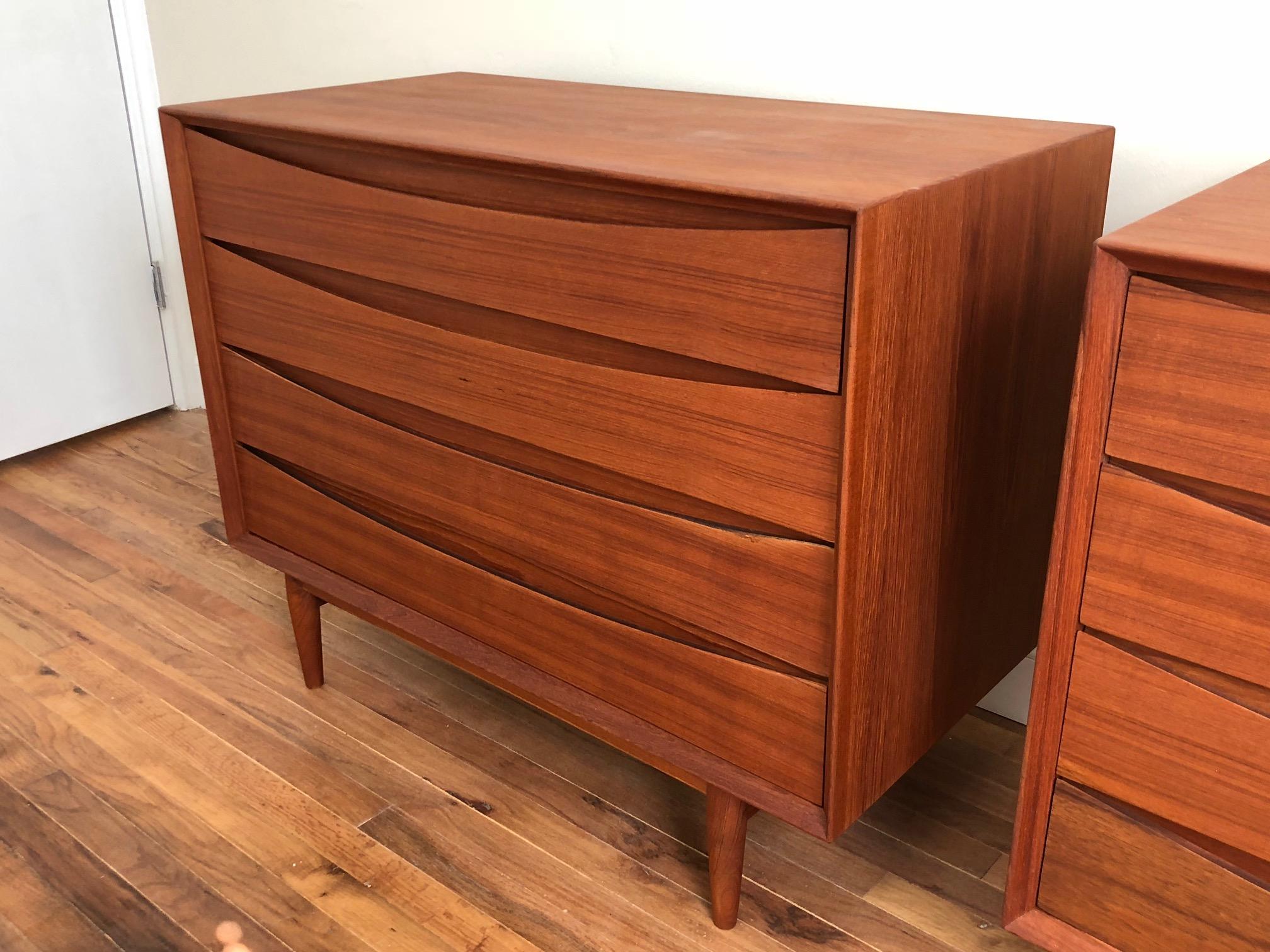 A pair of Classic Arne Vodder/Sibast Danish chests. Constructed of teak with top drawers containing dividers and trays. Each one measures approx. 19.5