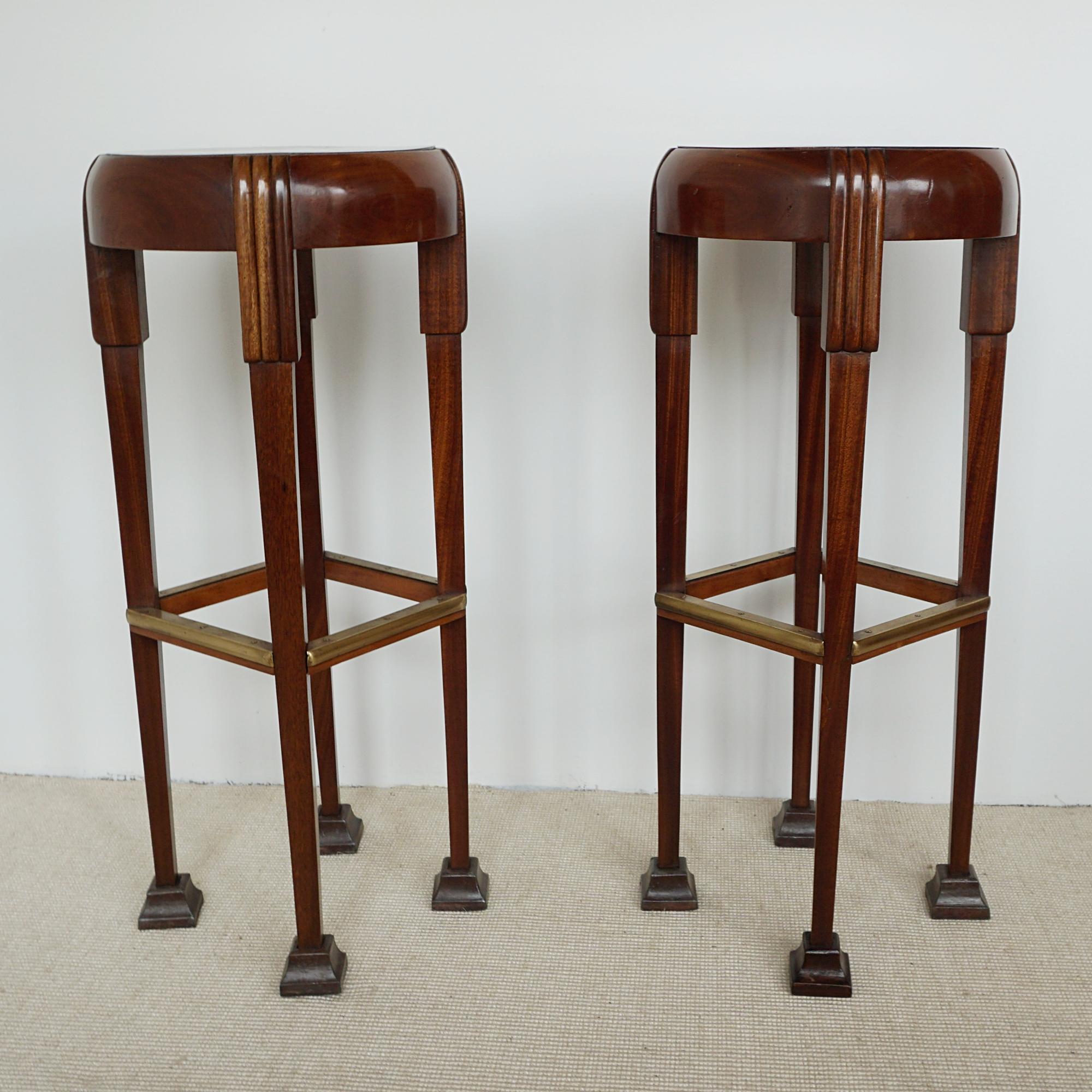 A pair of Art Deco bar stools. Solid walnut with figured walnut seat and brass banded stretchers.

Dimensions: H 80cm W 27cm

Origin: English

Date: Circa 1930

Item Number: 2404241