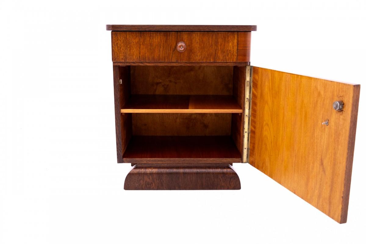 Walnut A pair of Art Deco bedside tables, Poland, 1950s. After renovation