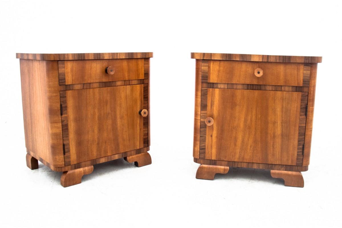 A pair of Art Deco bedside tables, Poland, 1950s.

Furniture in very good condition, after professional renovation.

Dimensions:

Tables: height 53 cm / width 52 cm / depth 37 cm.
