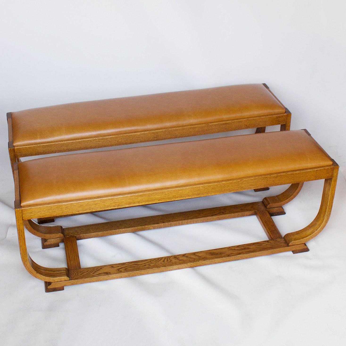 A pair of Art Deco benches with fluted curved legs over a rectangular frame. Re-upholstered in tan leather. Stamped Shepherd & Hedger to underside.

Dimensions: H 45 cm, W 137 cm, D 35.5 cm

Origin: English

Date: circa 1920

Item number: