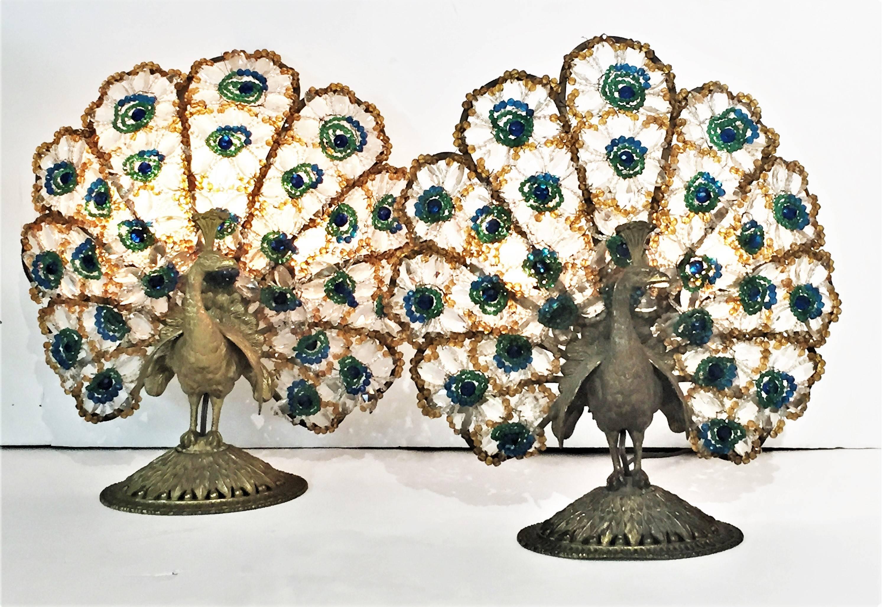 A Pair of Art Deco Bronze & Bohemian Crystal Peacock Nightstand Lamps, Ca. 1920s, rewired.

Dimensions: 16
