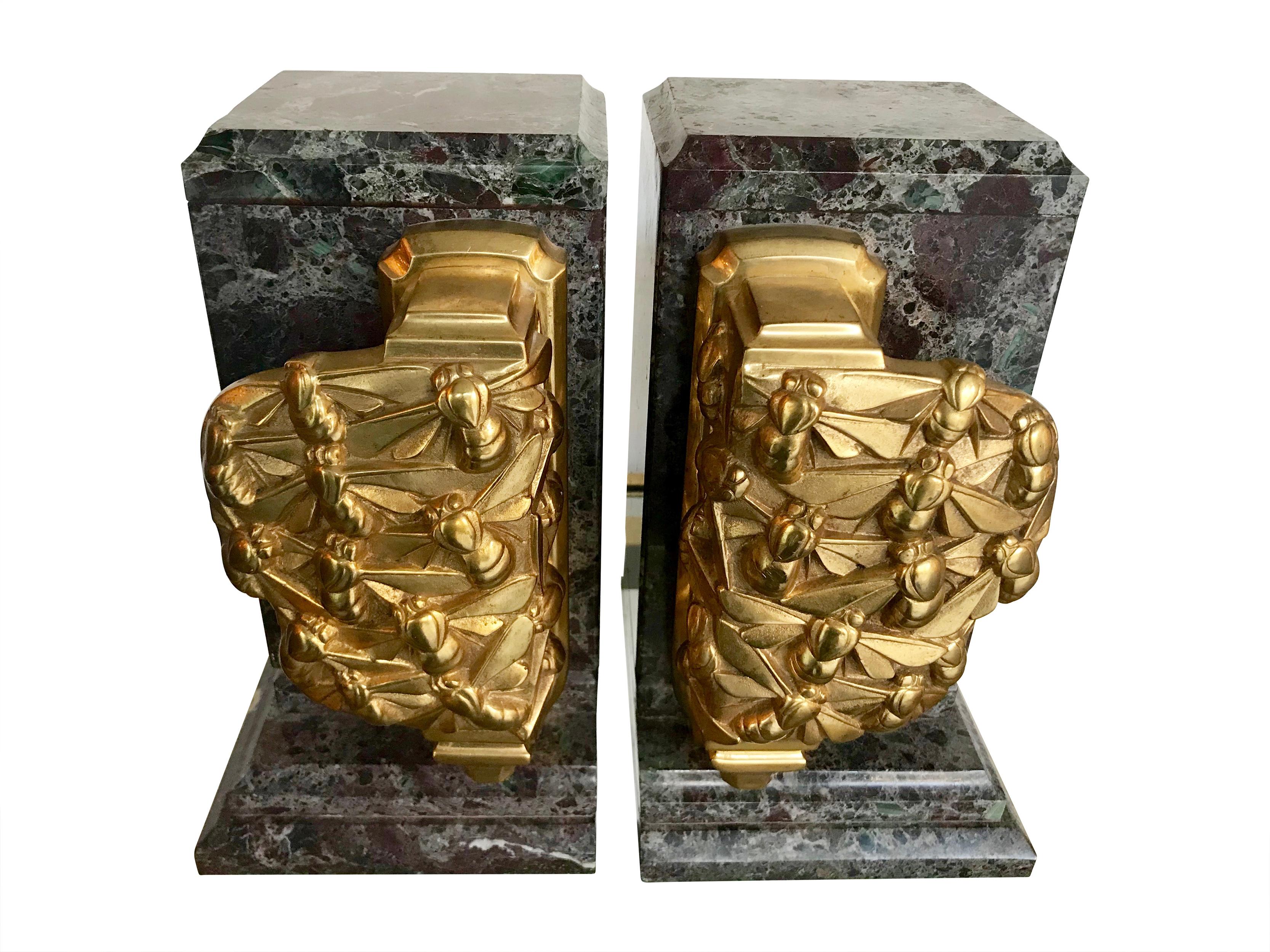 Cast A pair of Art Deco bookends of amazonite marble and cast gilt metal bees