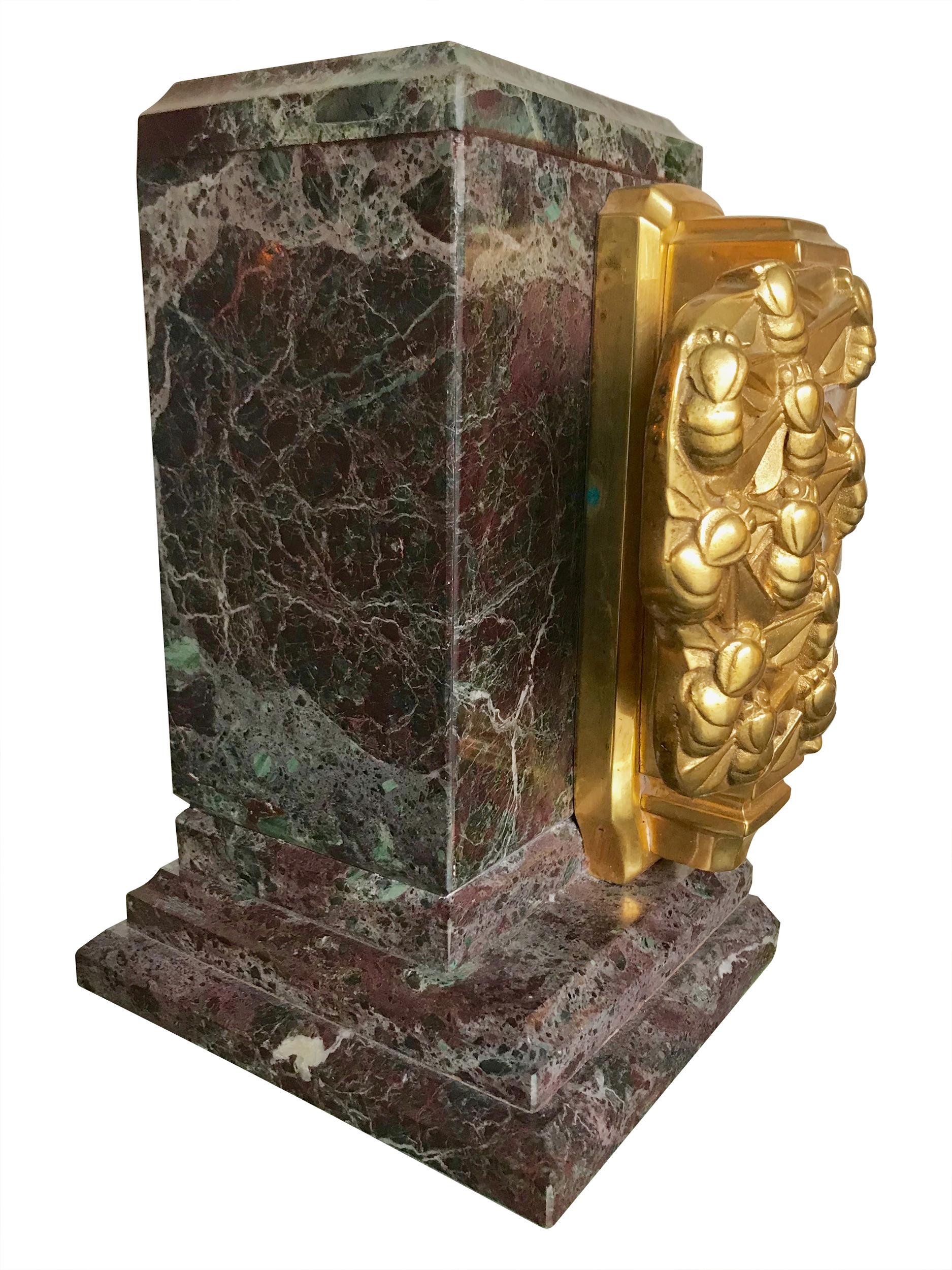 Mid-20th Century A pair of Art Deco bookends of amazonite marble and cast gilt metal bees