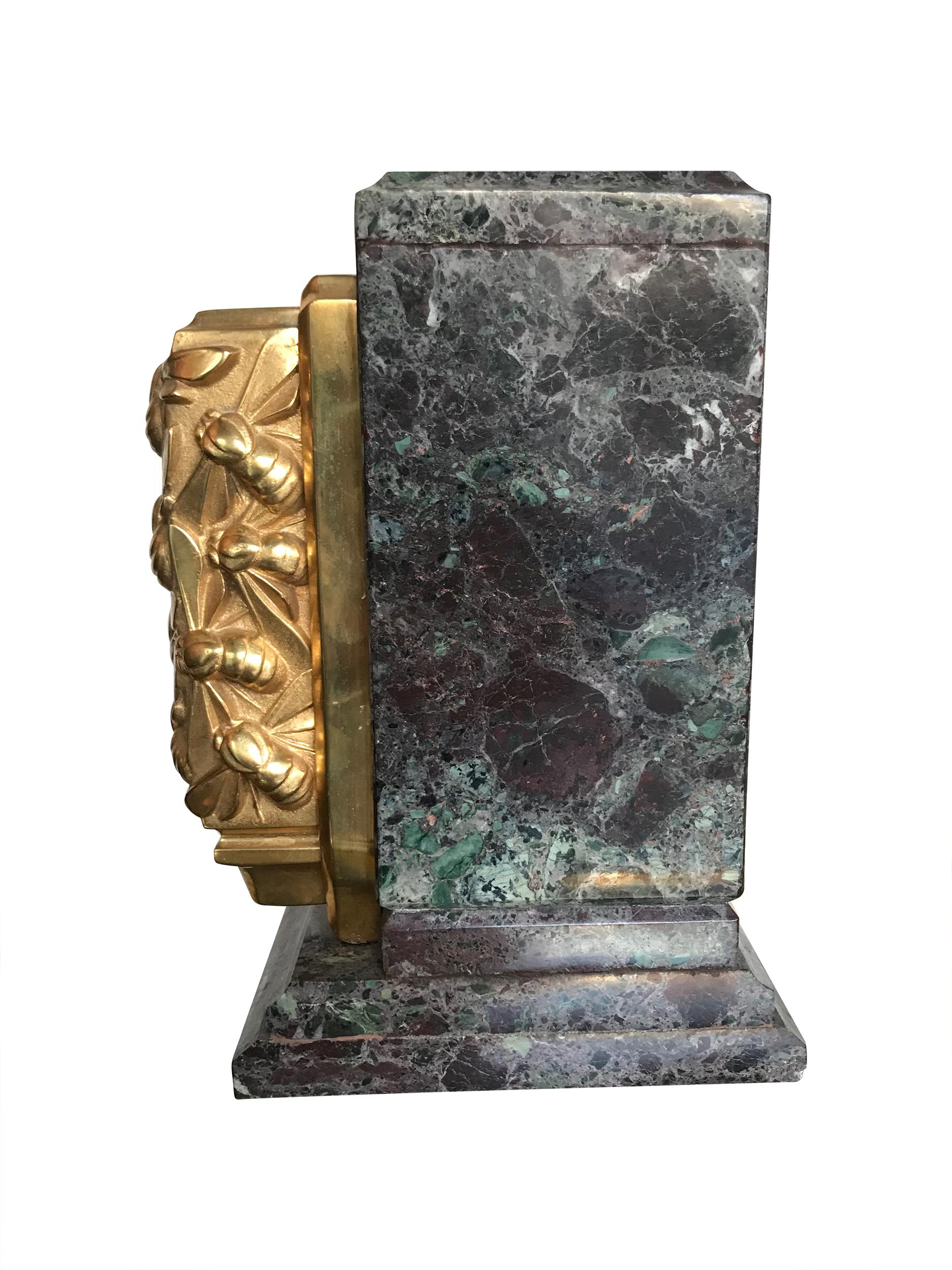 A pair of Art Deco bookends of amazonite marble and cast gilt metal bees 2