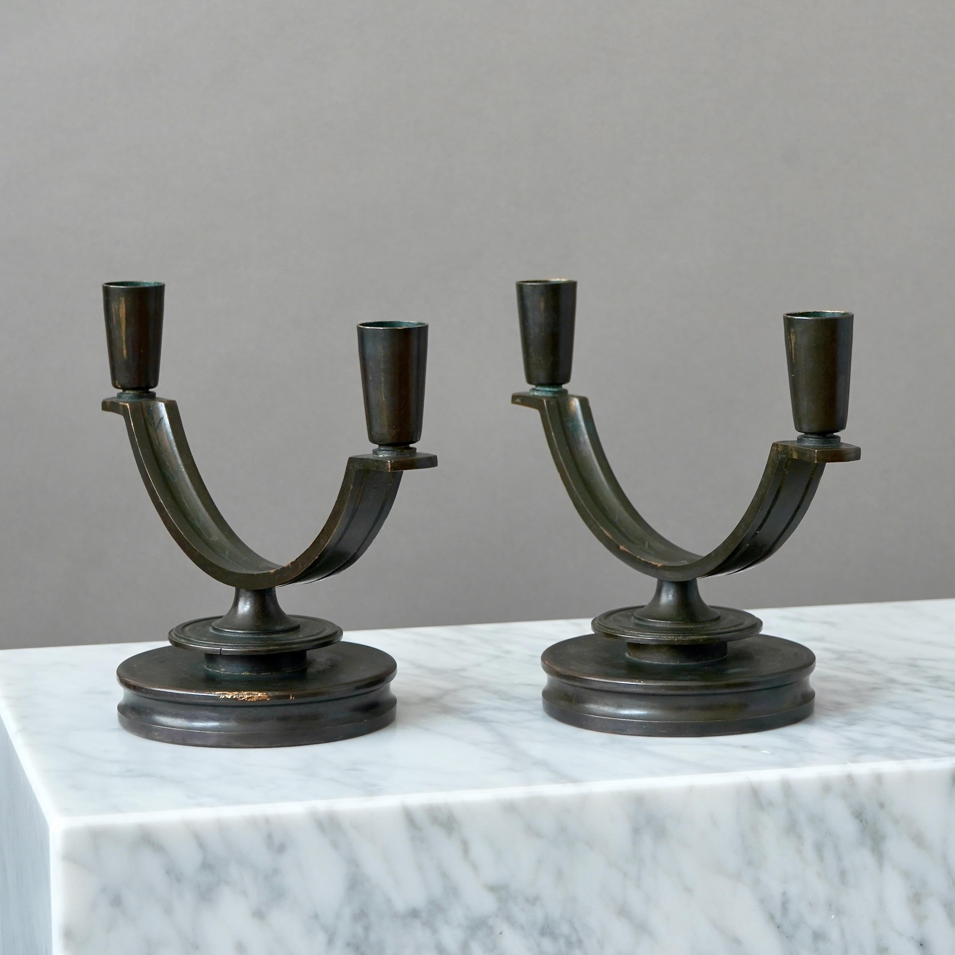 A pair of Art Deco Bronze Candelabras by Nordiska Juvelaktiebolaget Sweden 1930s 1