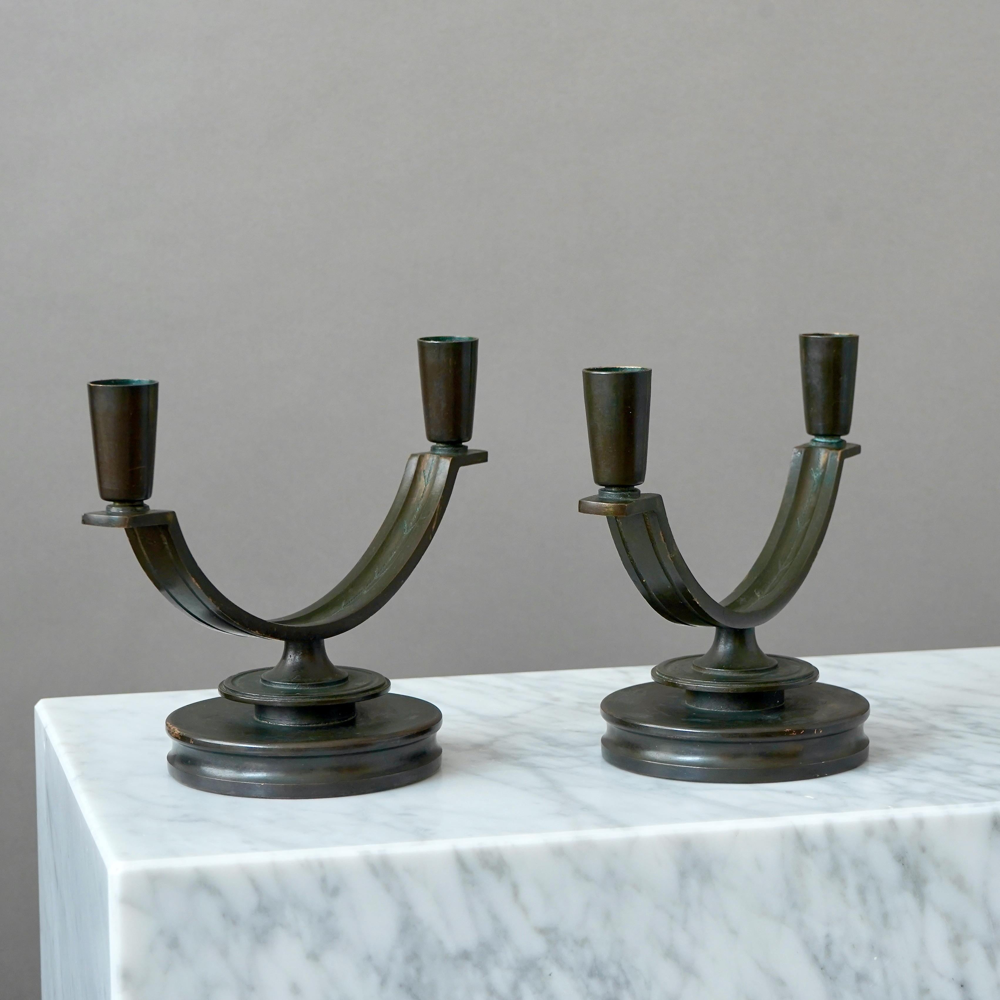 A pair of Art Deco Bronze Candelabras by Nordiska Juvelaktiebolaget Sweden 1930s 2