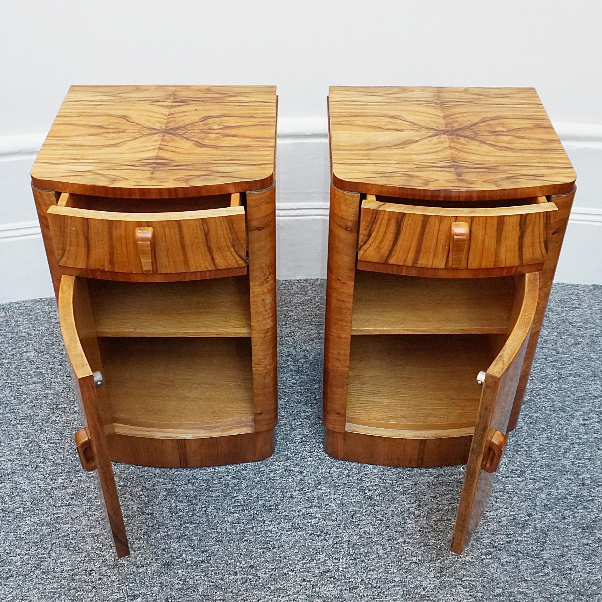 A pair of Art Deco bedside cabinets. Burr walnut veneered with figured walnut banding and original carved handles.

Dimensions: H 67cm W 38.5cm D 39cm

Origin: English 

Date: Circa 1935 

Item Number: 0812235