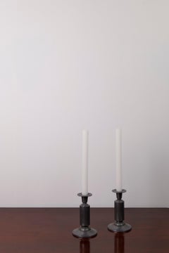 A Pair of Art Deco candle sticks by Just Andersen, model 1424, Denmark, 1930s