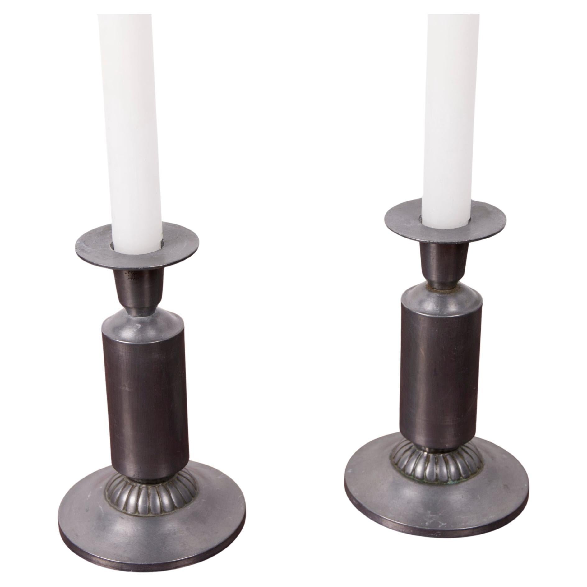 A Pair of Art Deco candle sticks by Just Andersen, model 1424, Denmark, 1930s