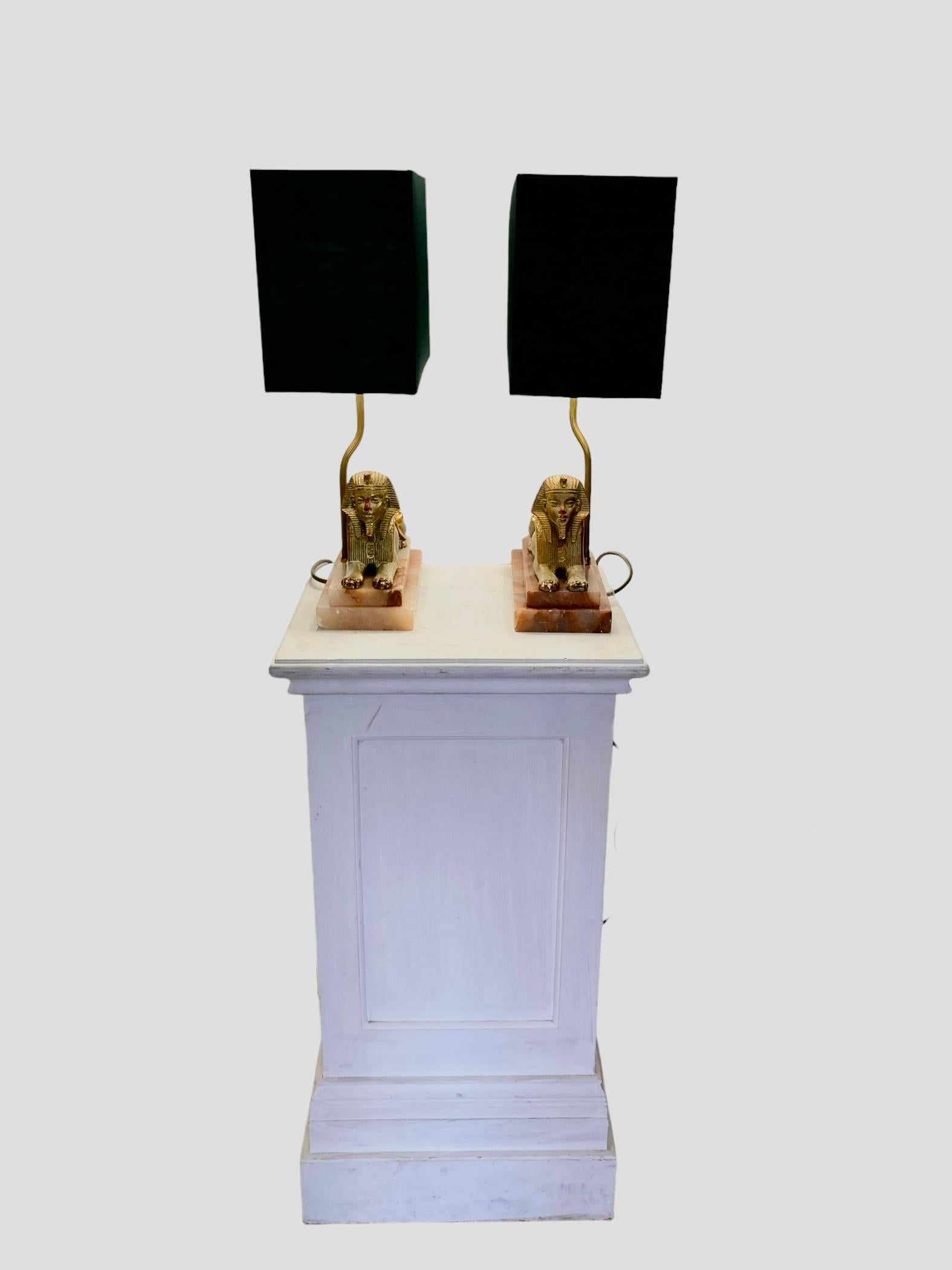 20th Century A Pair of Art Deco Egytian Sphinx Table Lamps on a Marble Base Dark Green Shades