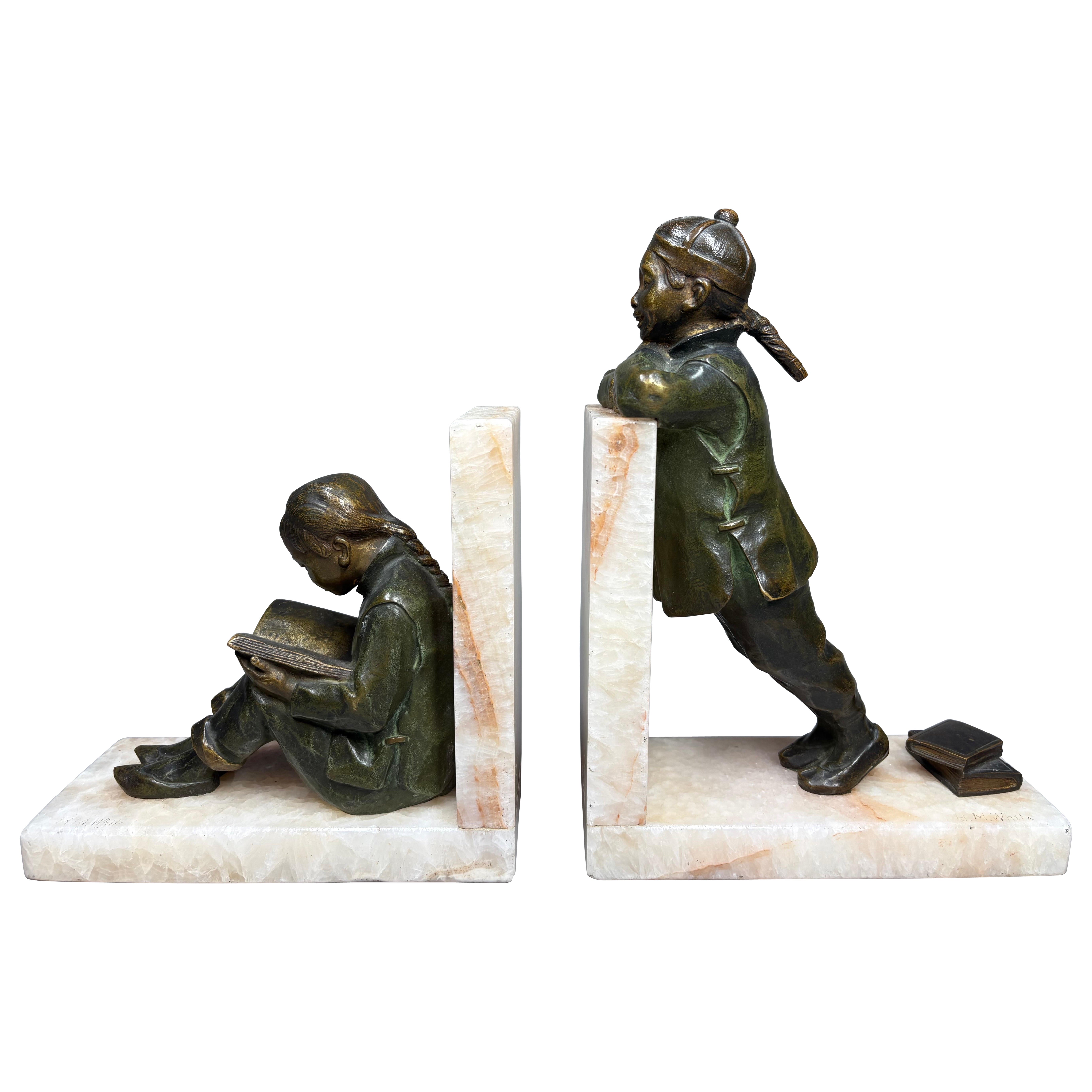 Art Deco Bookends by Hester Mabel White, Bronze 
Onyx, Circa 1930