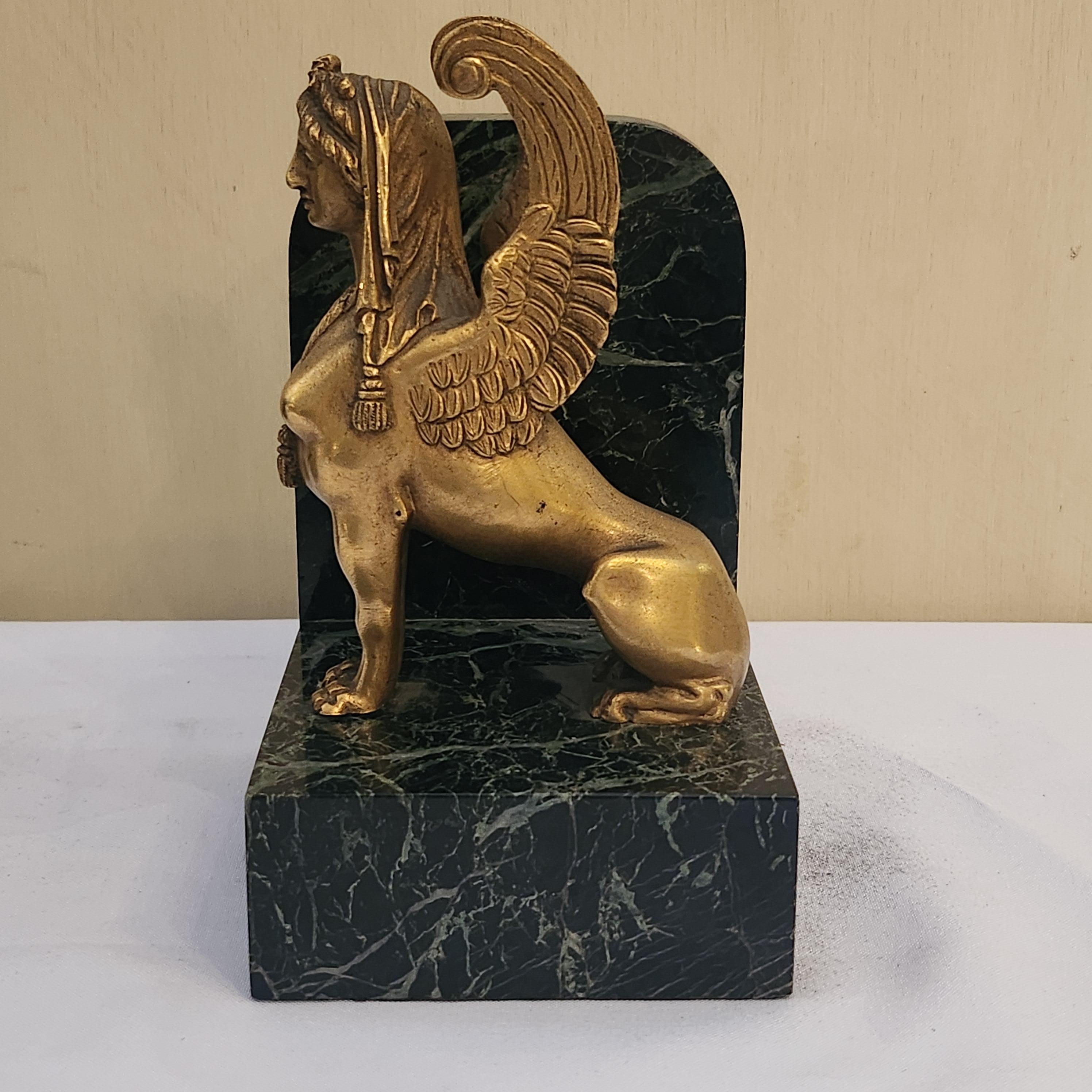 19th Century A pair of Art Deco Gilt Bronze and Marble Base Sphinxes Bookends For Sale