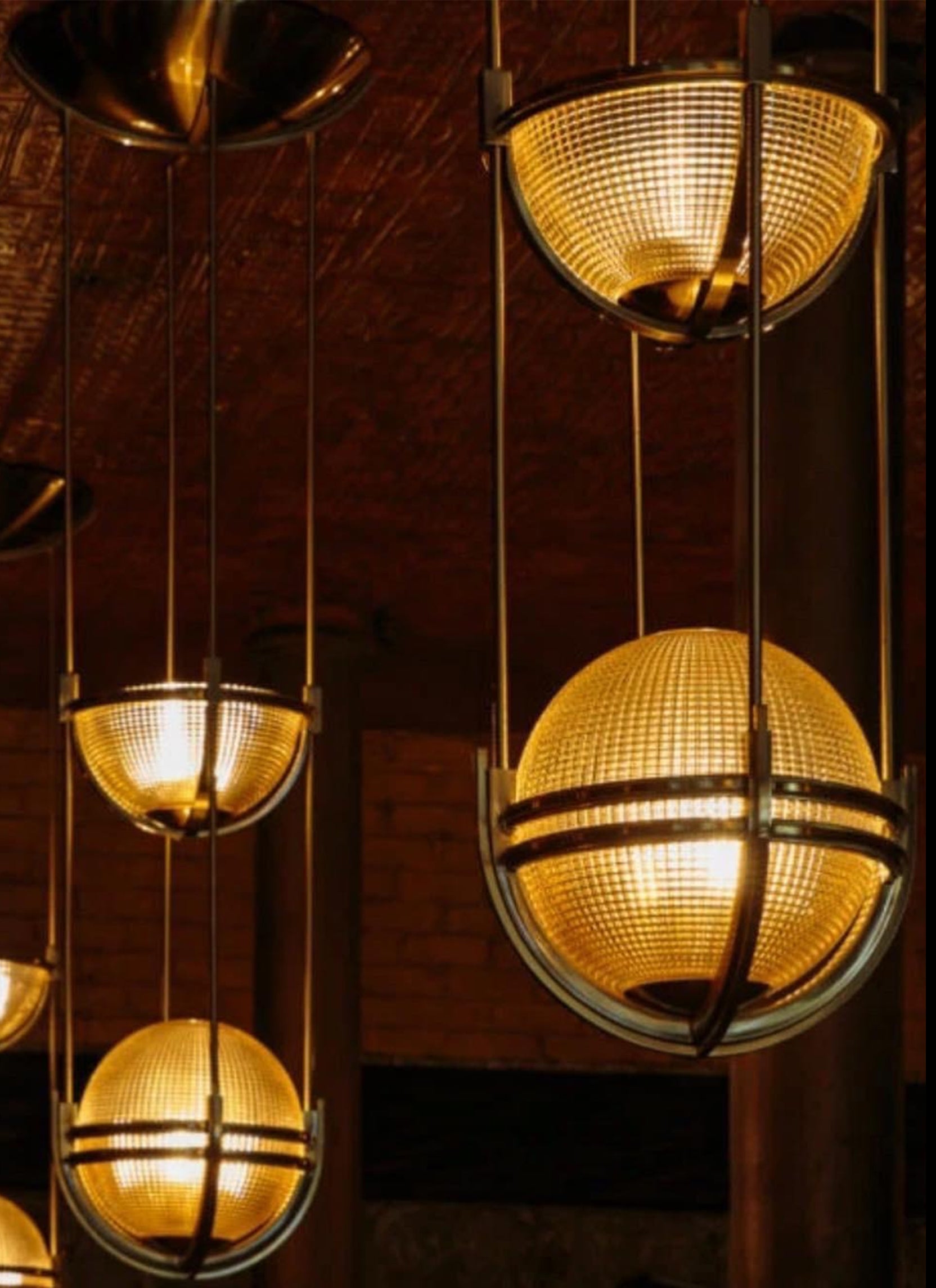 A pair of Art Deco Holophane Globular glass pendant ceiling lights white metal with brass finishing touches made for a London Bar

Modern era lighting that evokes the beautiful globular lines of the Art Deco aesthetic.

