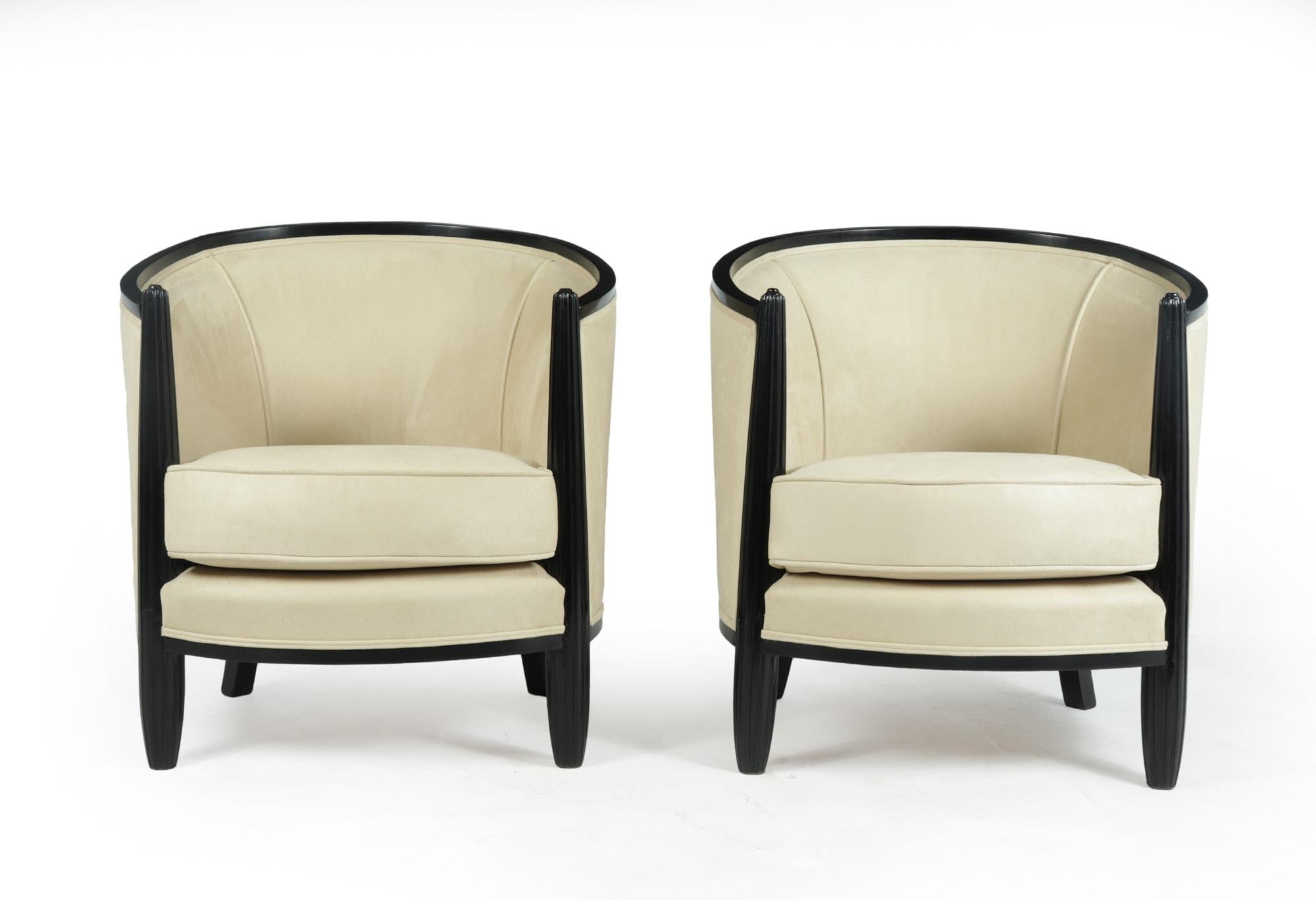 A pair of armchairs with fluted front uprights and curved backrests with in ebonised hardwood, the chairs were hand made in France in the 1920’s, we have stripped them glued the frames fully polished the wood, then had them fully upholstered and