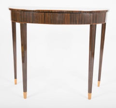 Pair of Art Deco Macassar Ebony Demilune Tables with Maple Tipped Feet
