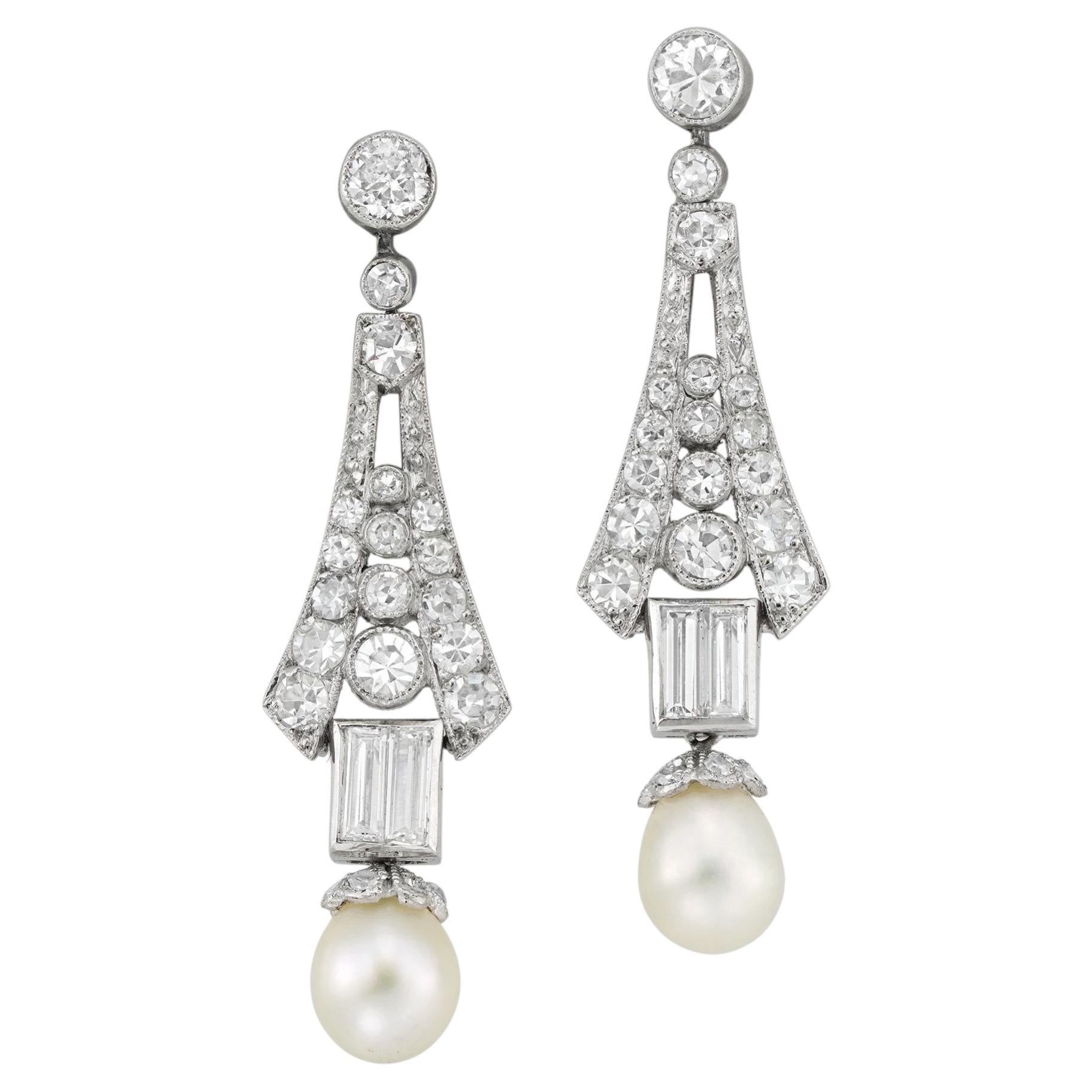 A pair of Art Deco pearl and diamond drop earrings