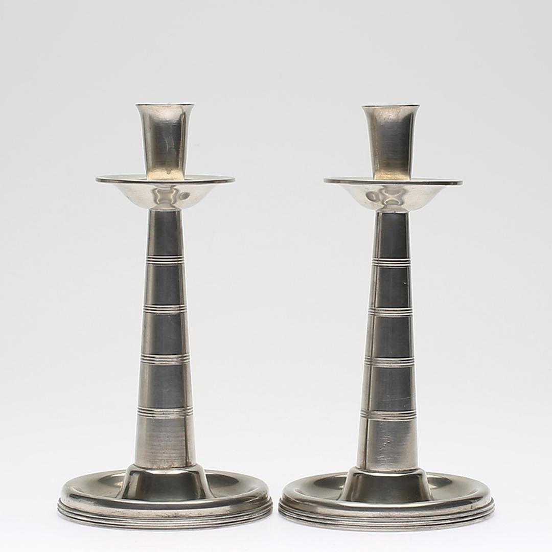 A pair of Art Deco pewter candlesticks, by GAB Tenn Svensk

Sweden, Vara, circa 1925

Size: 25 cm tall.